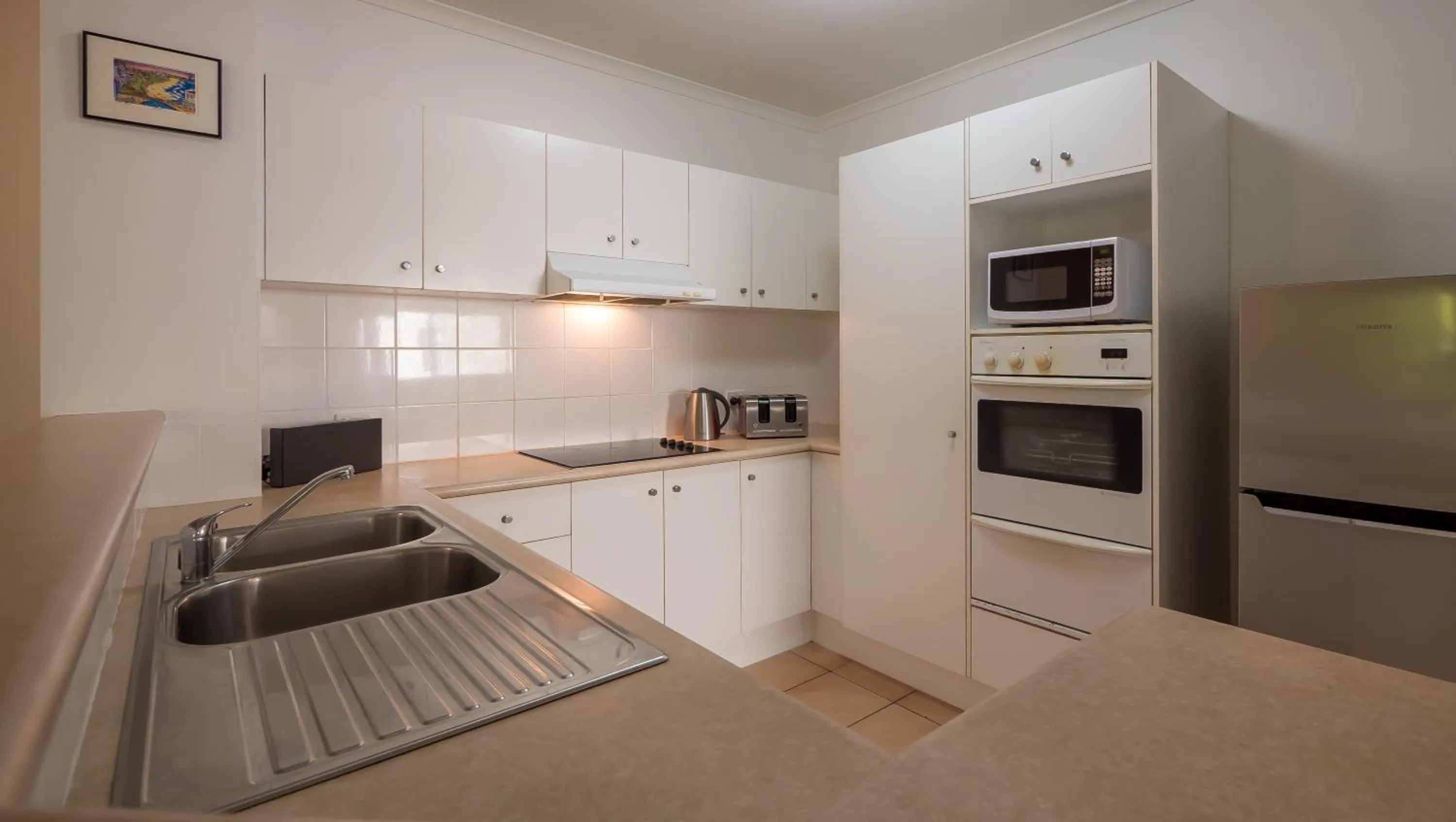 Kitchen or kitchenette in Sanctuary Lake Apartments