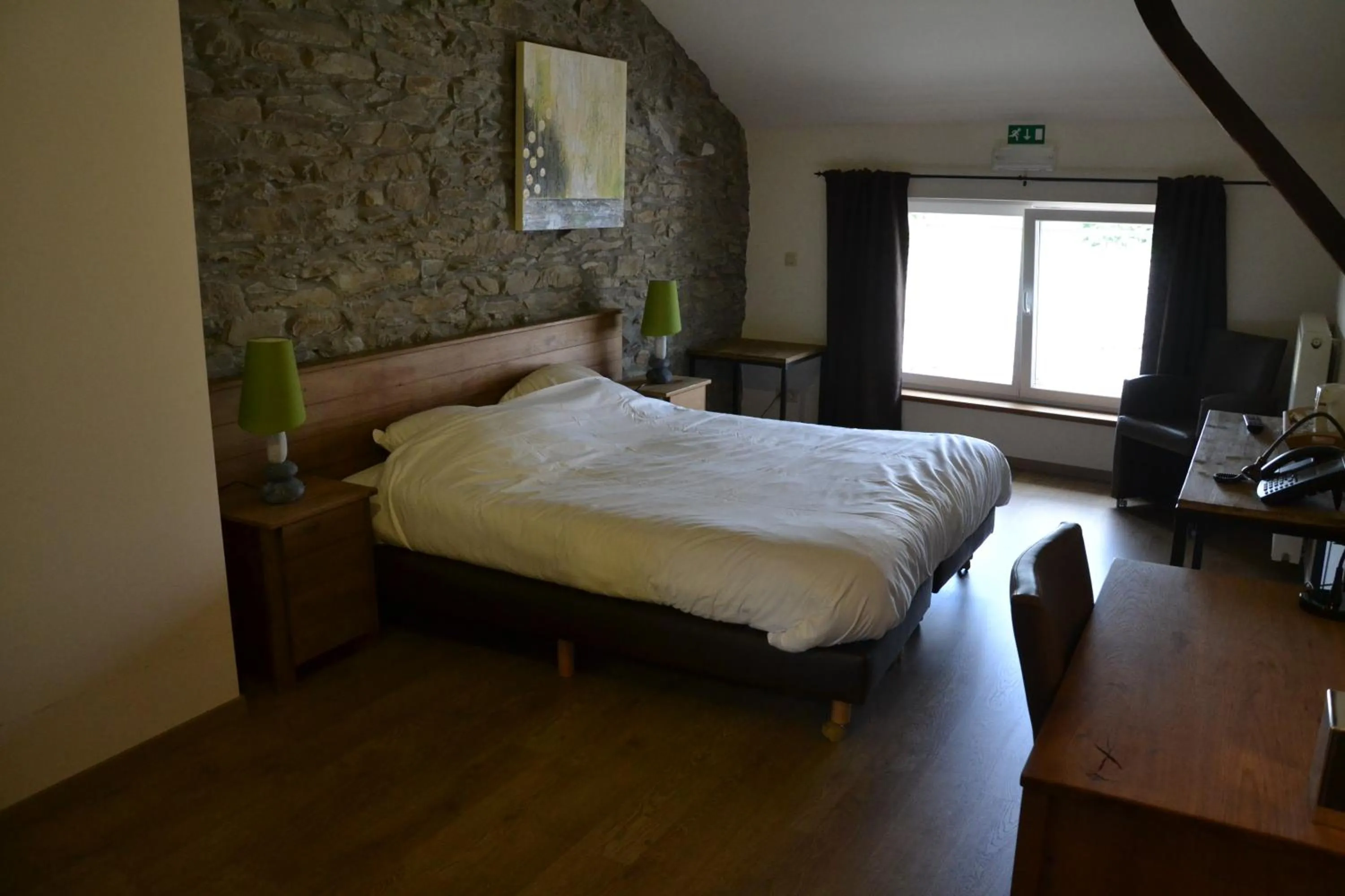 Bed in Auberge Le Temps des Saveurs