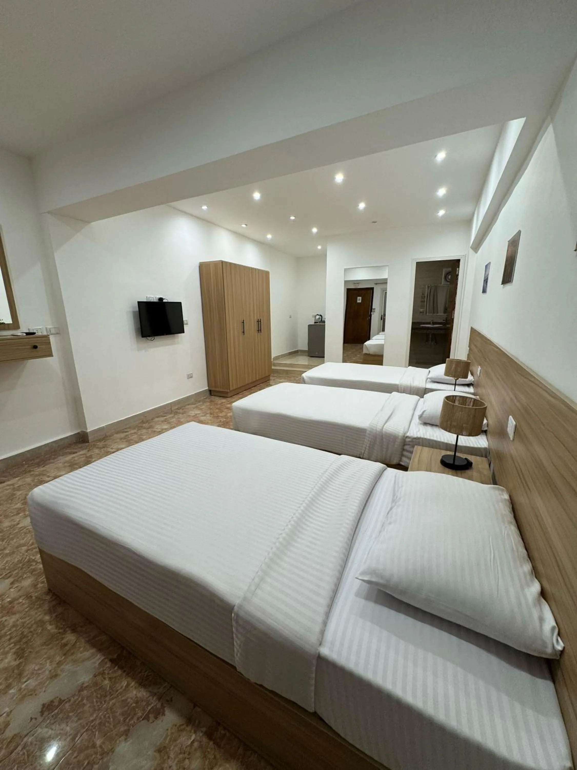 Bed in Lilly Rooms and Studio