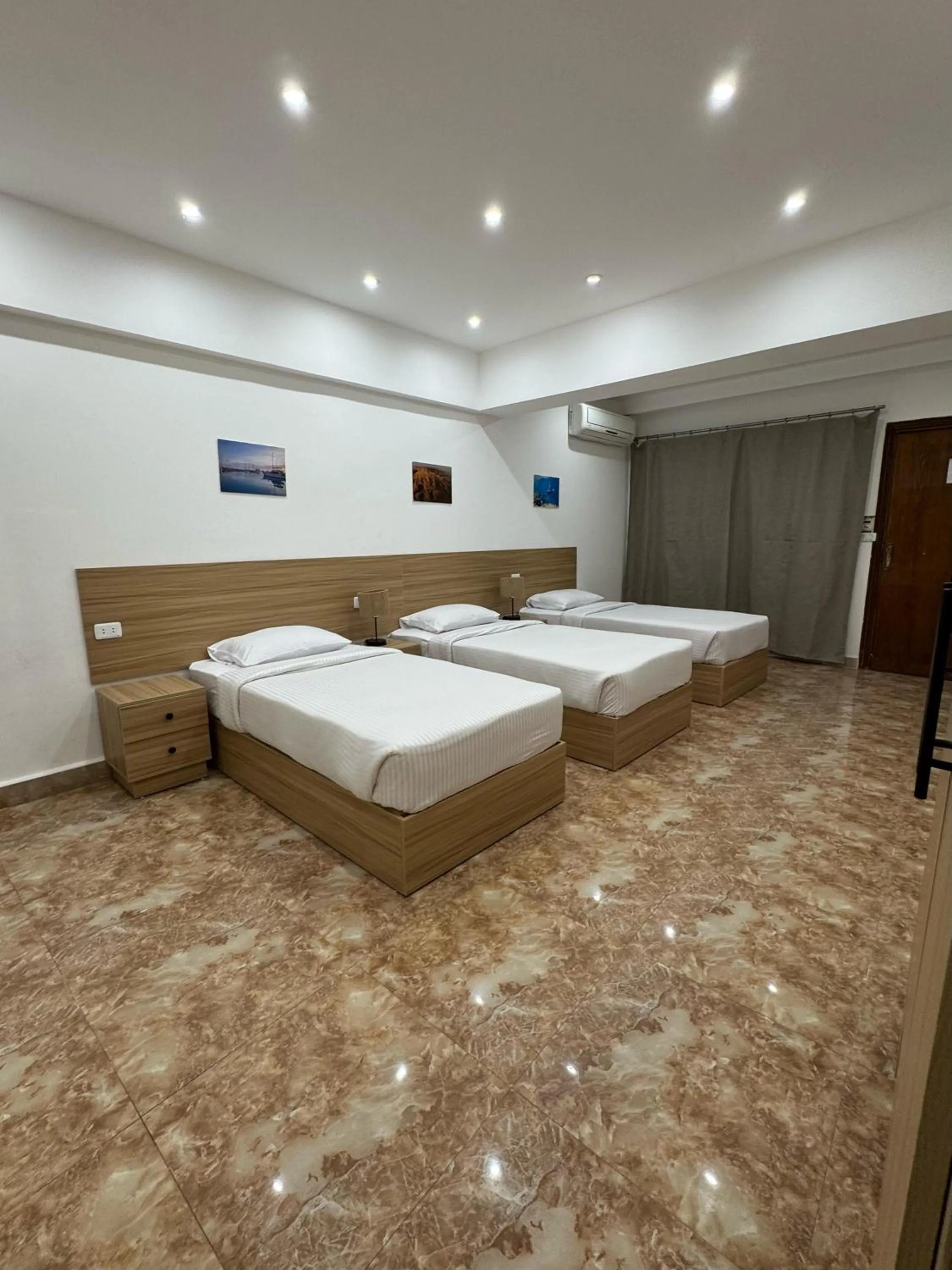 Bed in Lilly Rooms and Studio