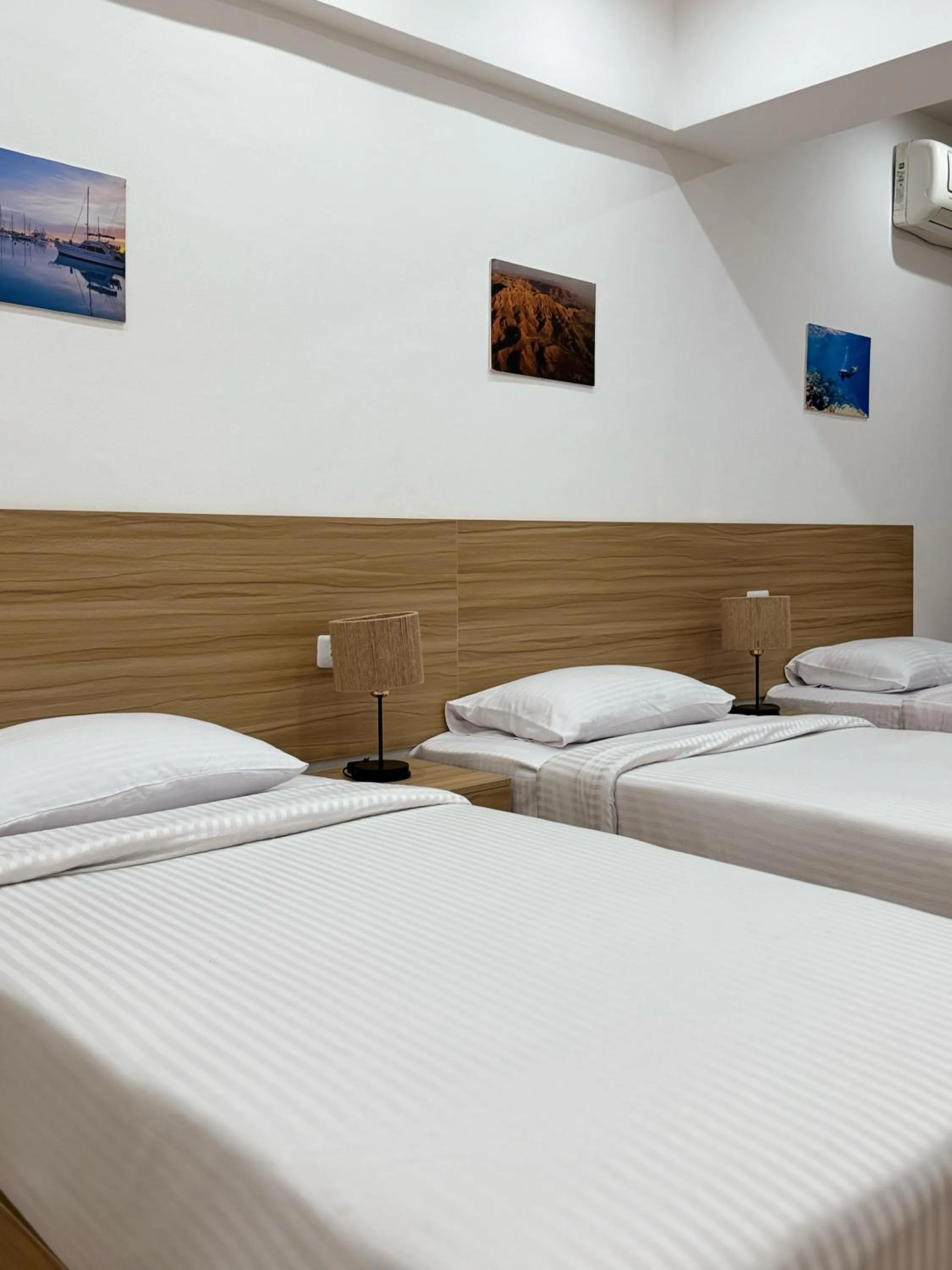 Bed in Lilly Rooms and Studio