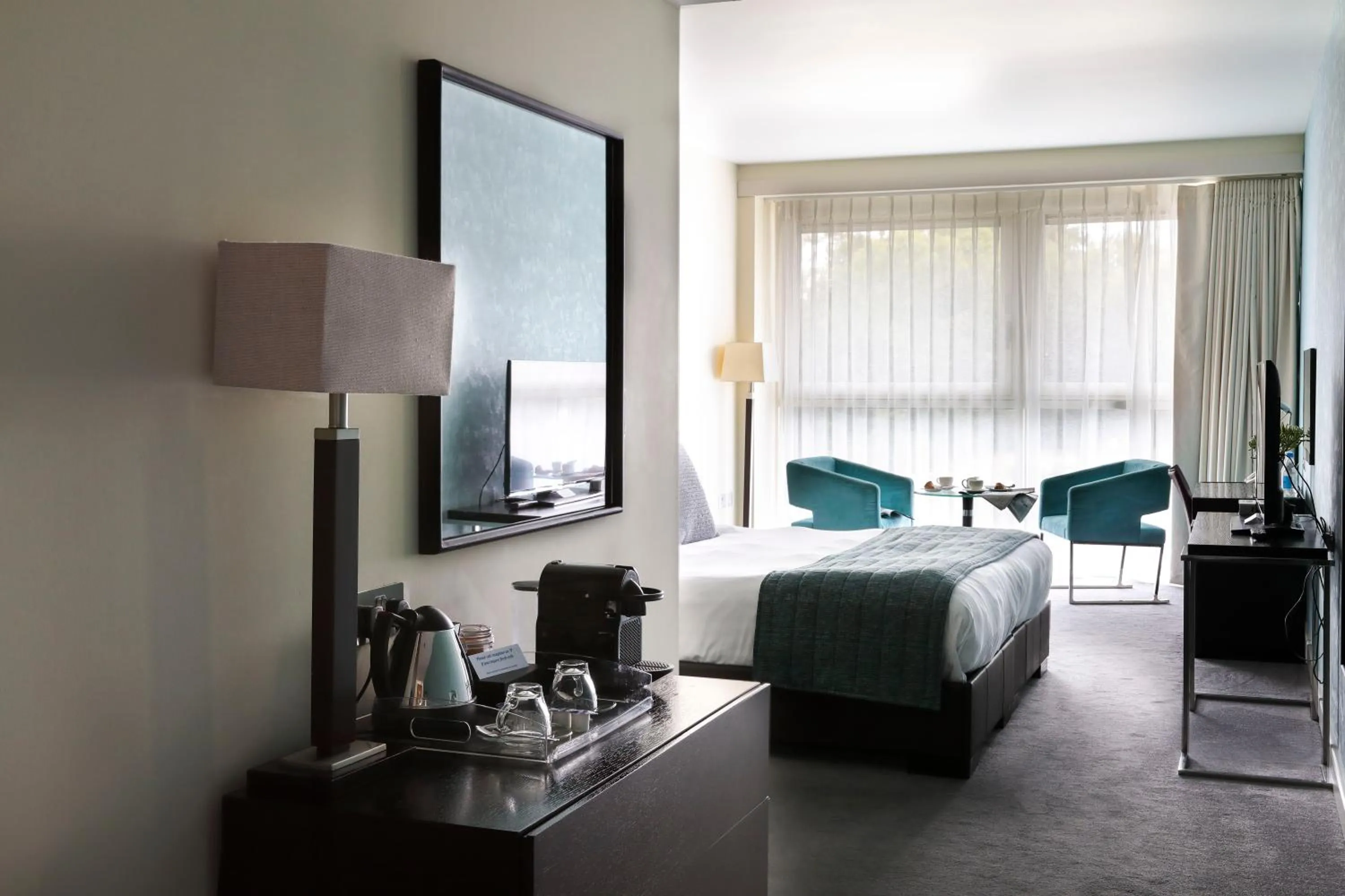 Bed in Captain's Club Hotel & Spa