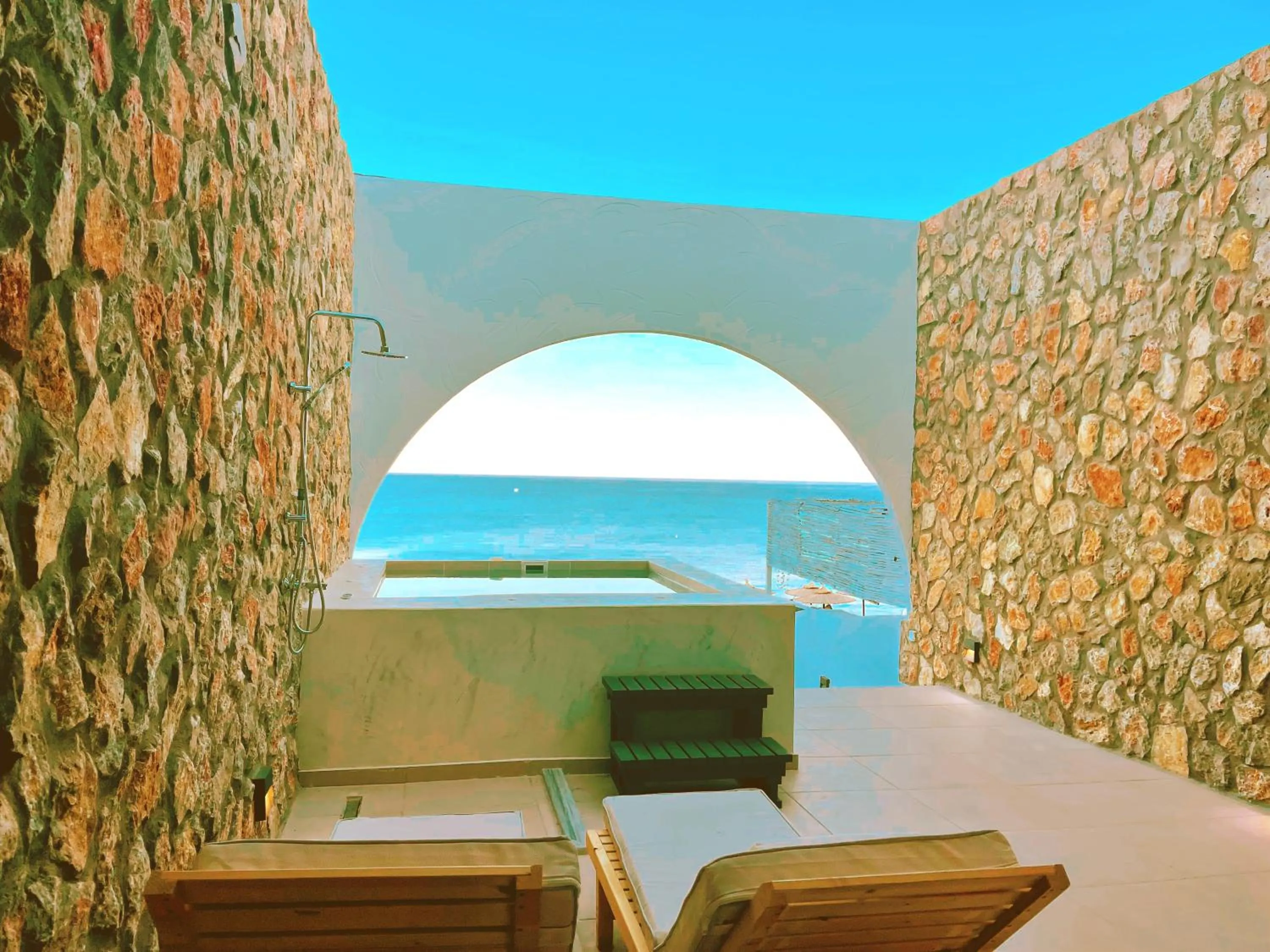 Delfini Beach Hotel & Suites