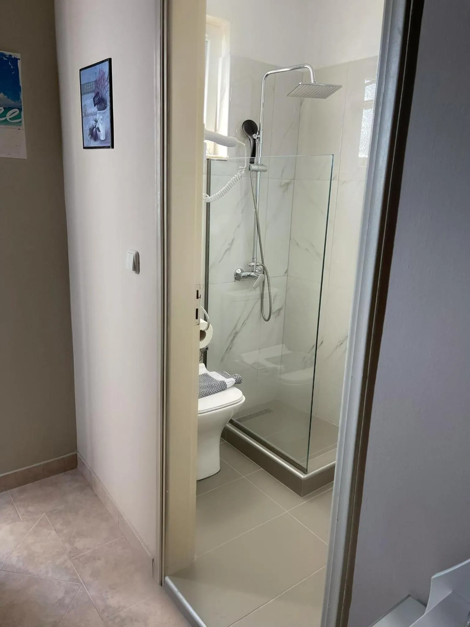 Delfini Beach Hotel & Suites