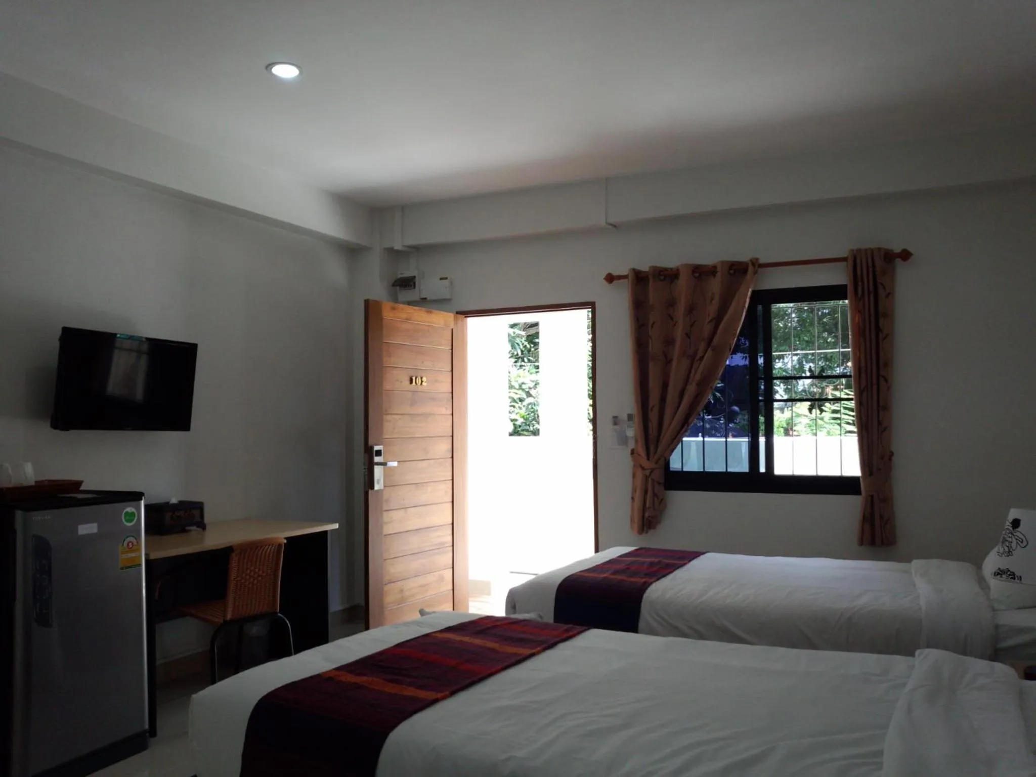 Photo of the whole room, Bed in Rena House Chiang Mai