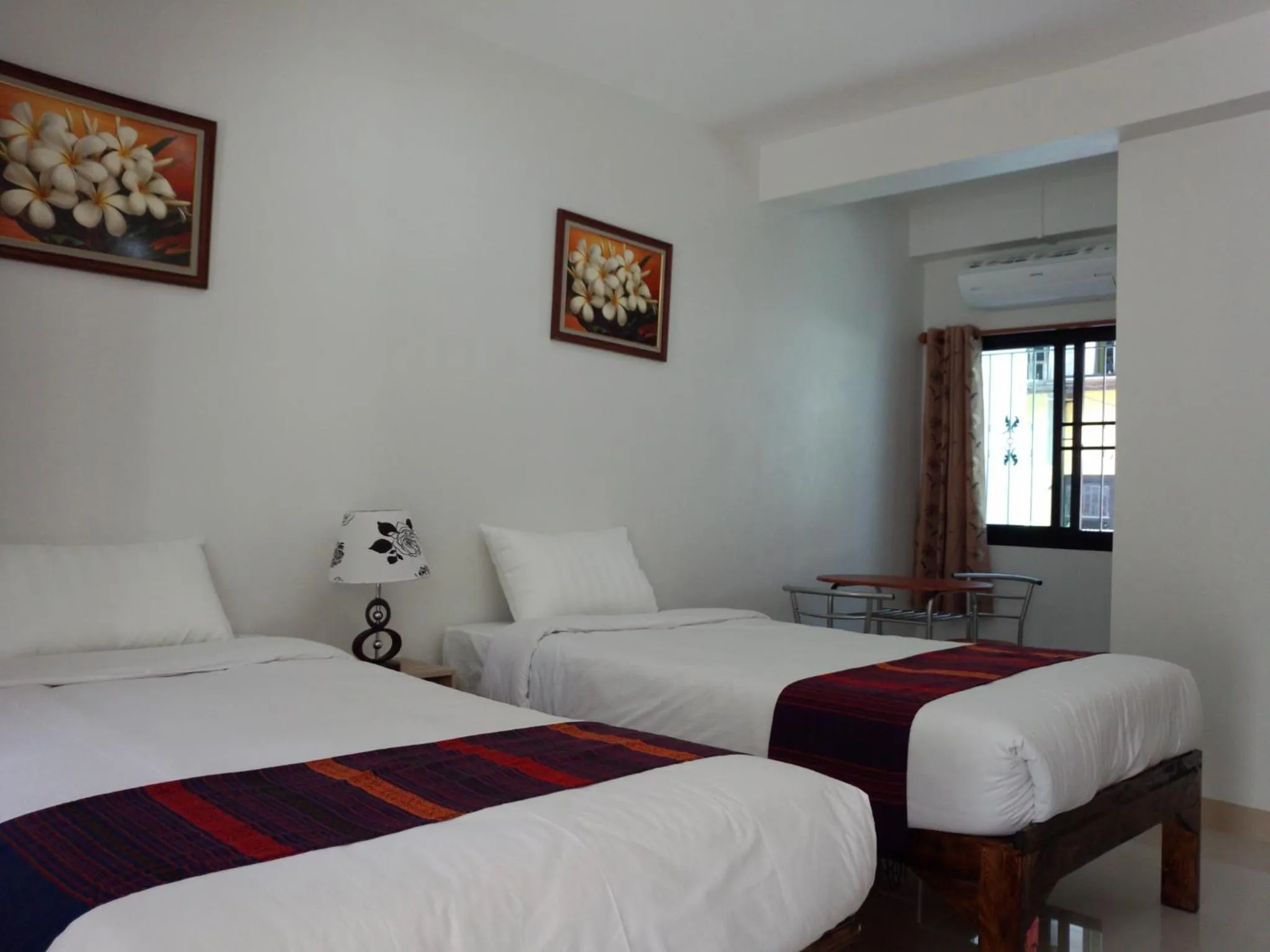 Photo of the whole room, Bed in Rena House Chiang Mai