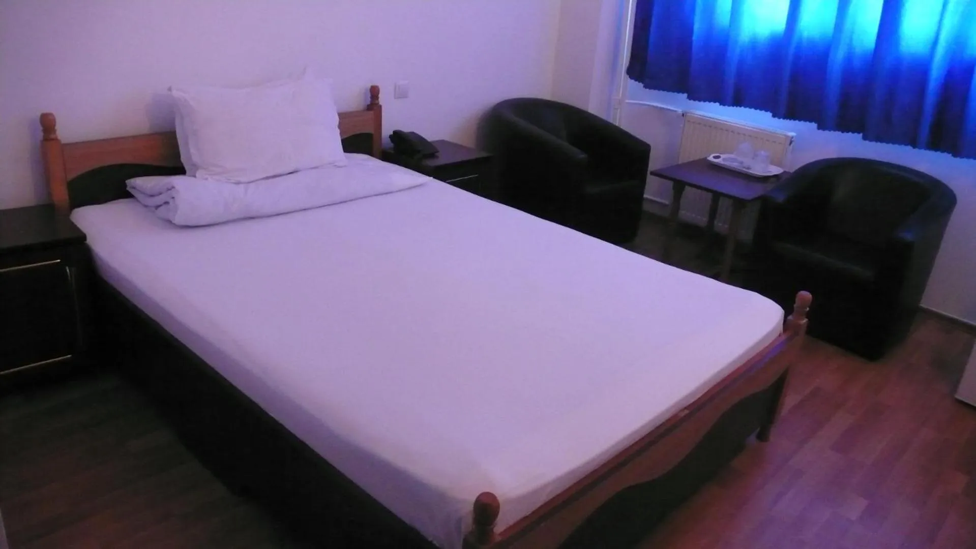 Bed in Hotel Uranus