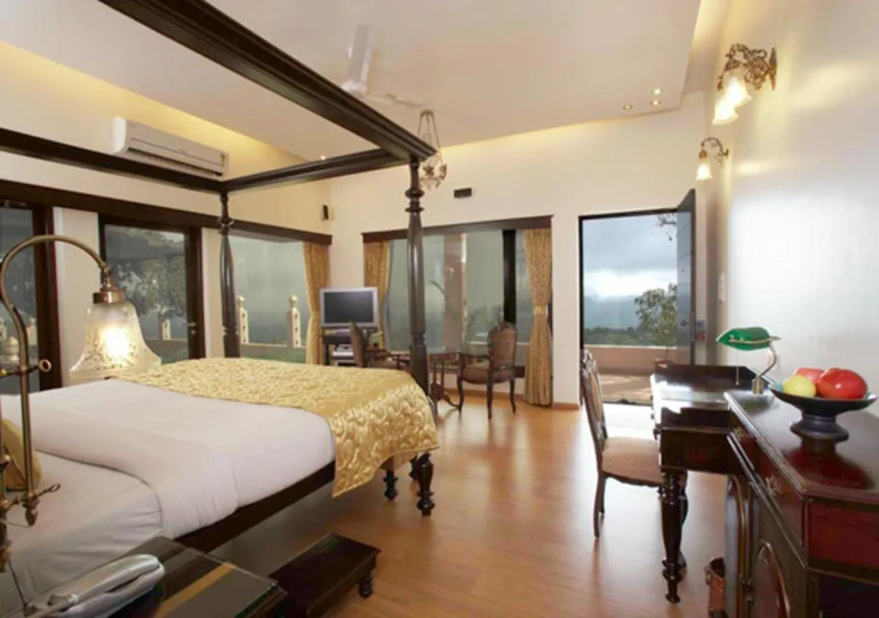 Bed in Brightland Resort & Spa