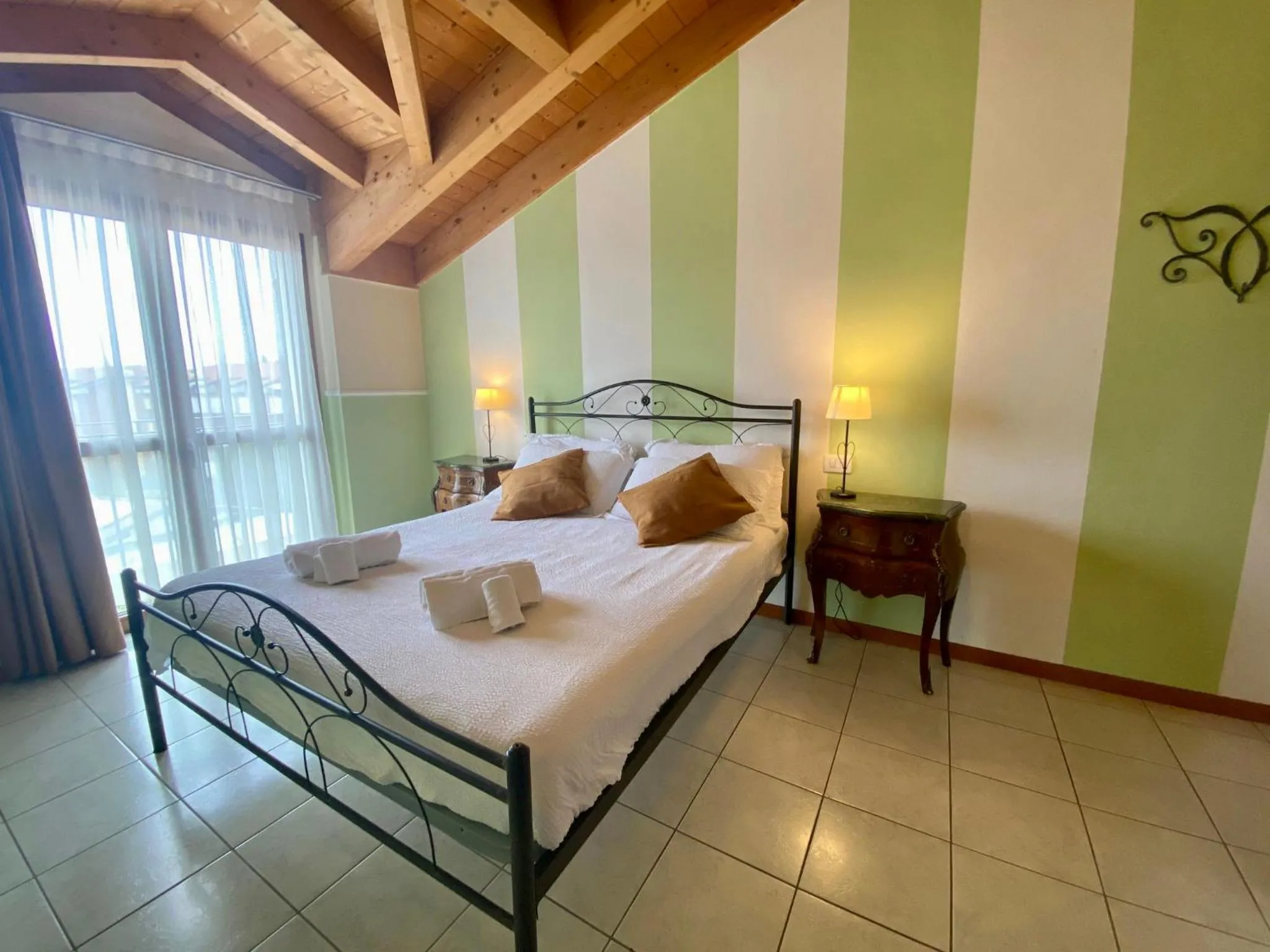 Bed in Ferretti Residence Garda Palace