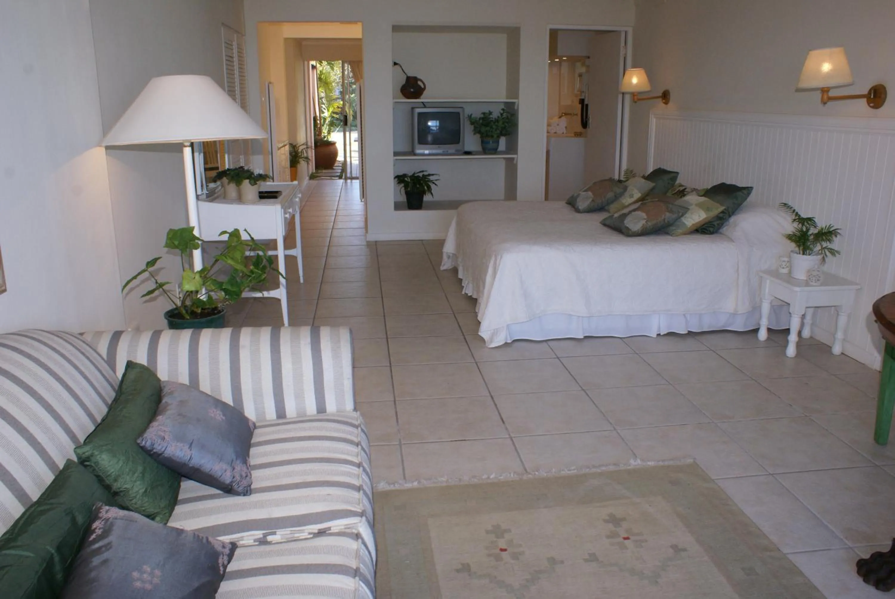 Photo of the whole room, Bed in The Pink Lodge on The Beach
