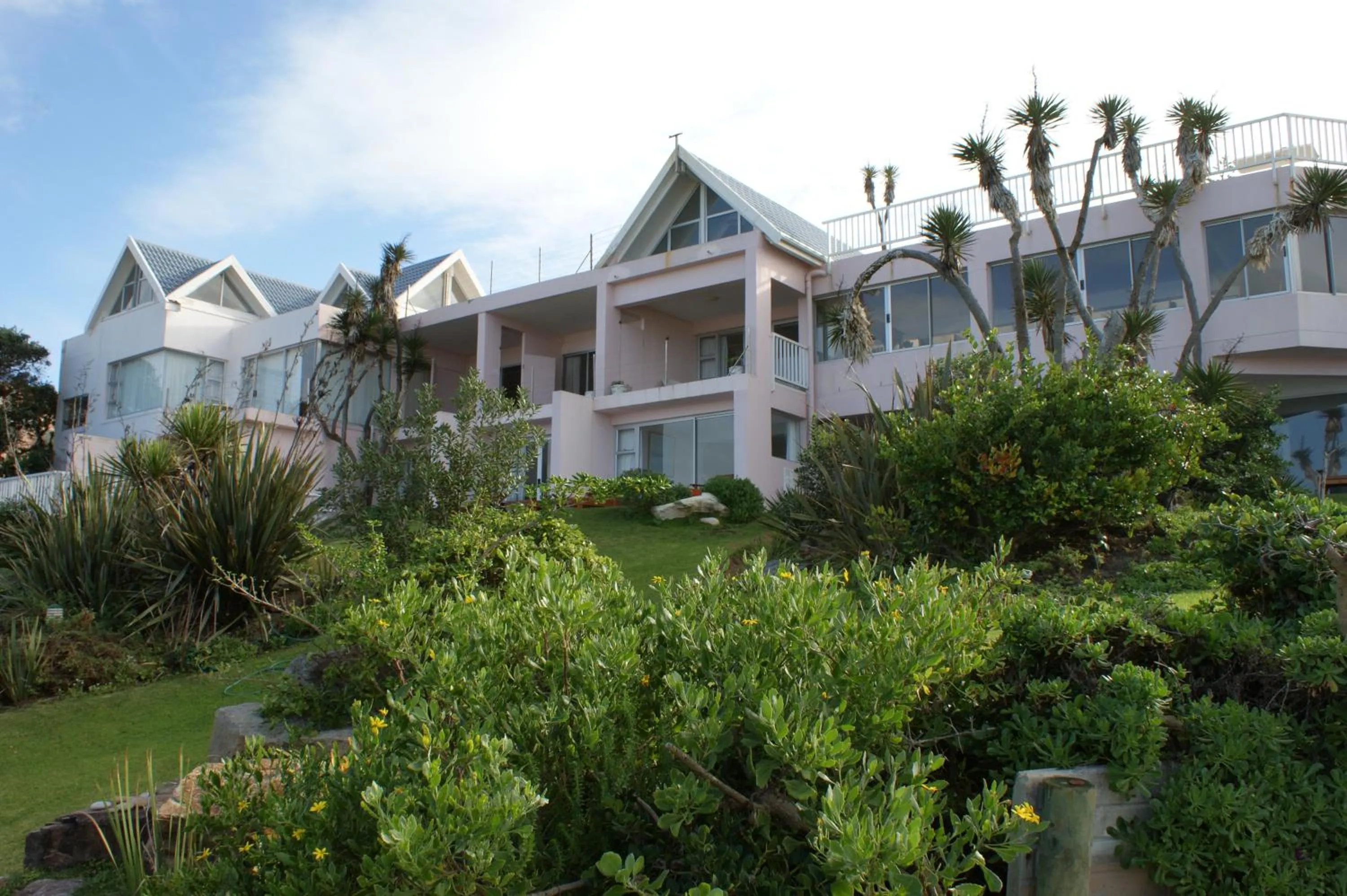 Property building in The Pink Lodge on The Beach