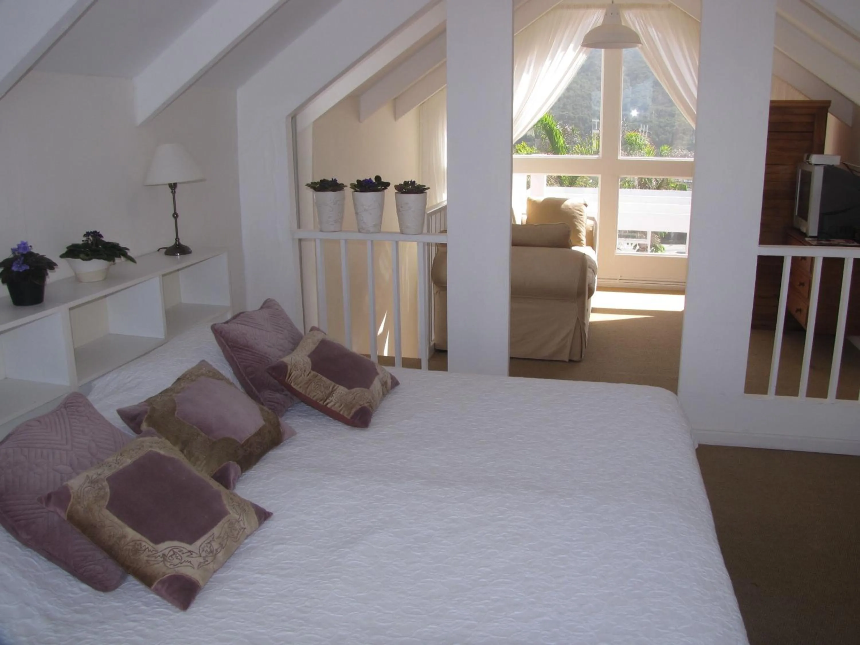 Photo of the whole room, Bed in The Pink Lodge on The Beach