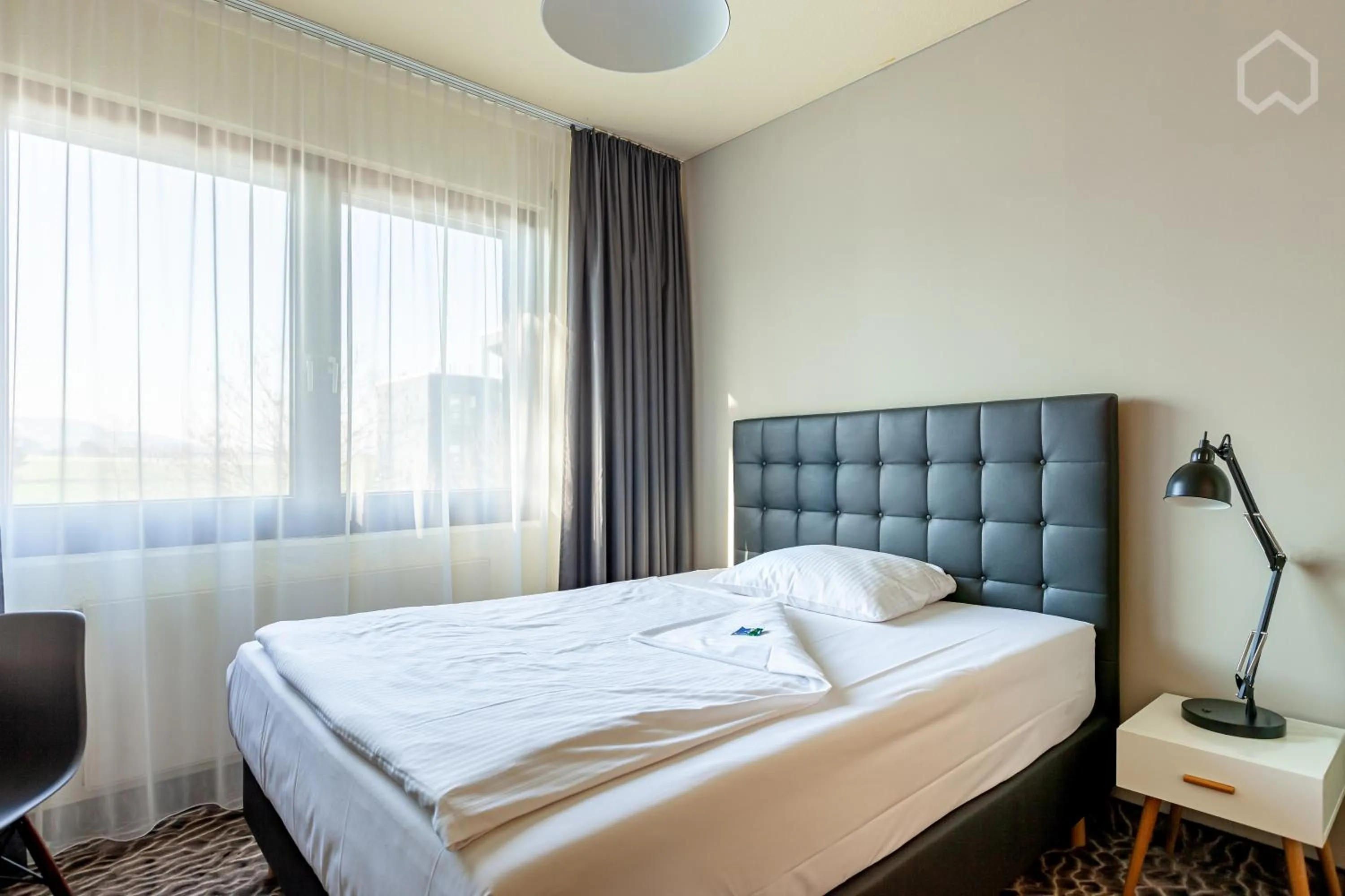 Photo of the whole room, Bed in DOBLERGREEN Hotel Stuttgart-Gerlingen