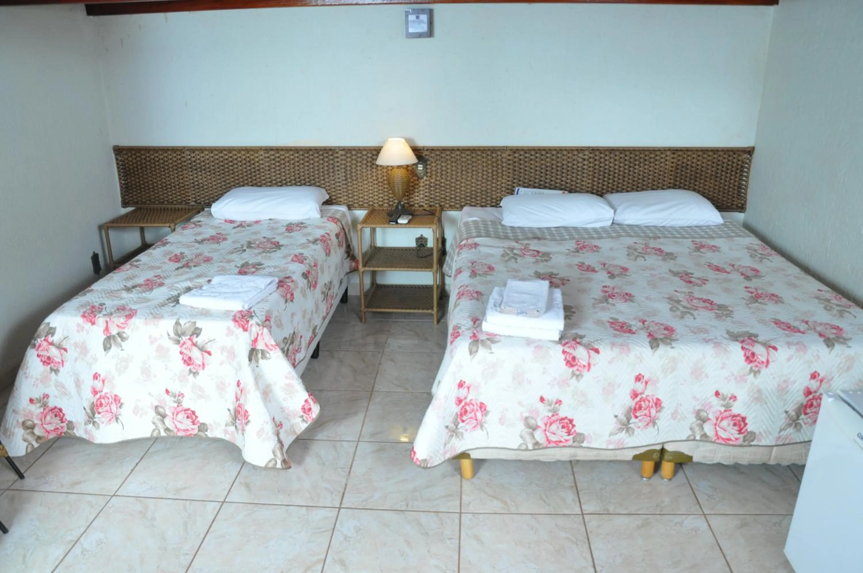 Bed in Pousada Beco da Lua