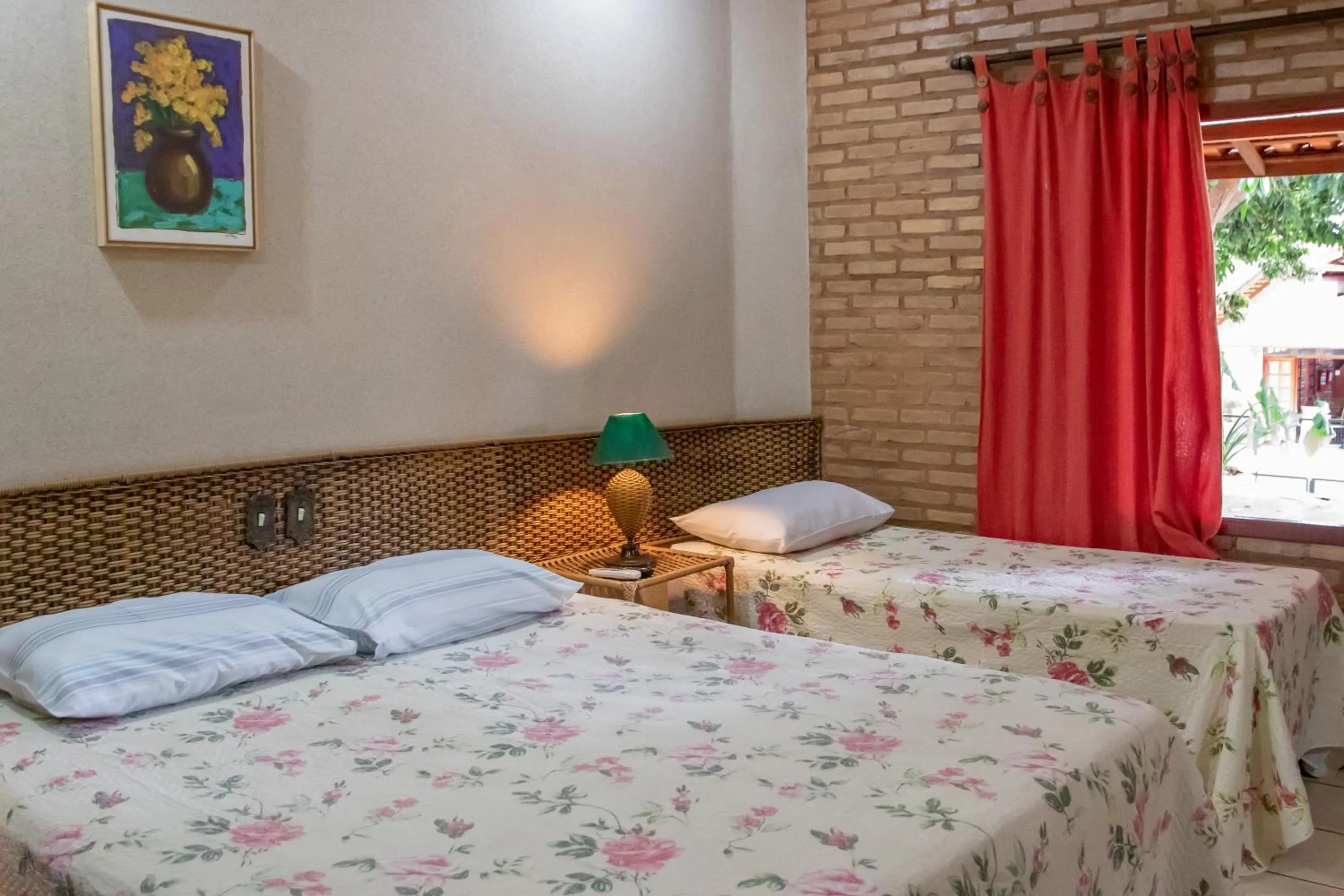 Bed in Pousada Beco da Lua