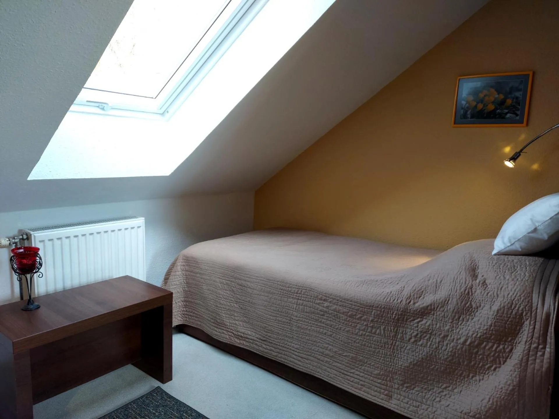 Bed in A Mecsek Gyöngye Apartmanhaz