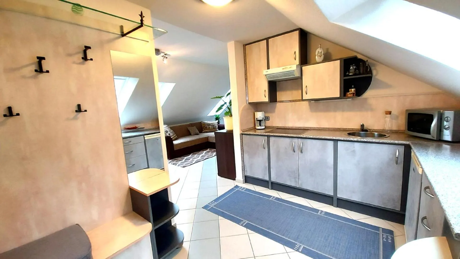 Kitchen or kitchenette in A Mecsek Gyöngye Apartmanhaz