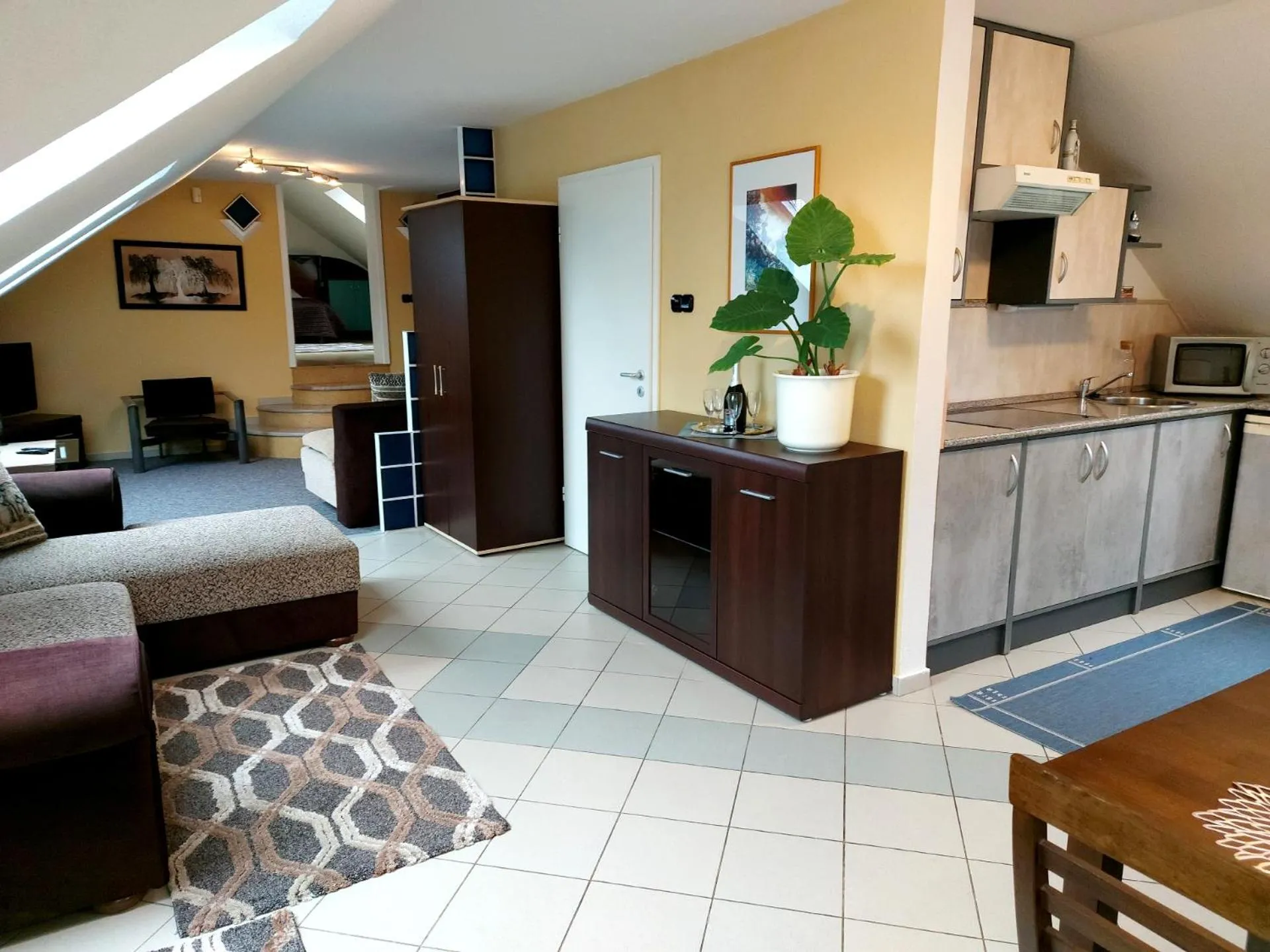 Living room, Bed in A Mecsek Gyöngye Apartmanhaz