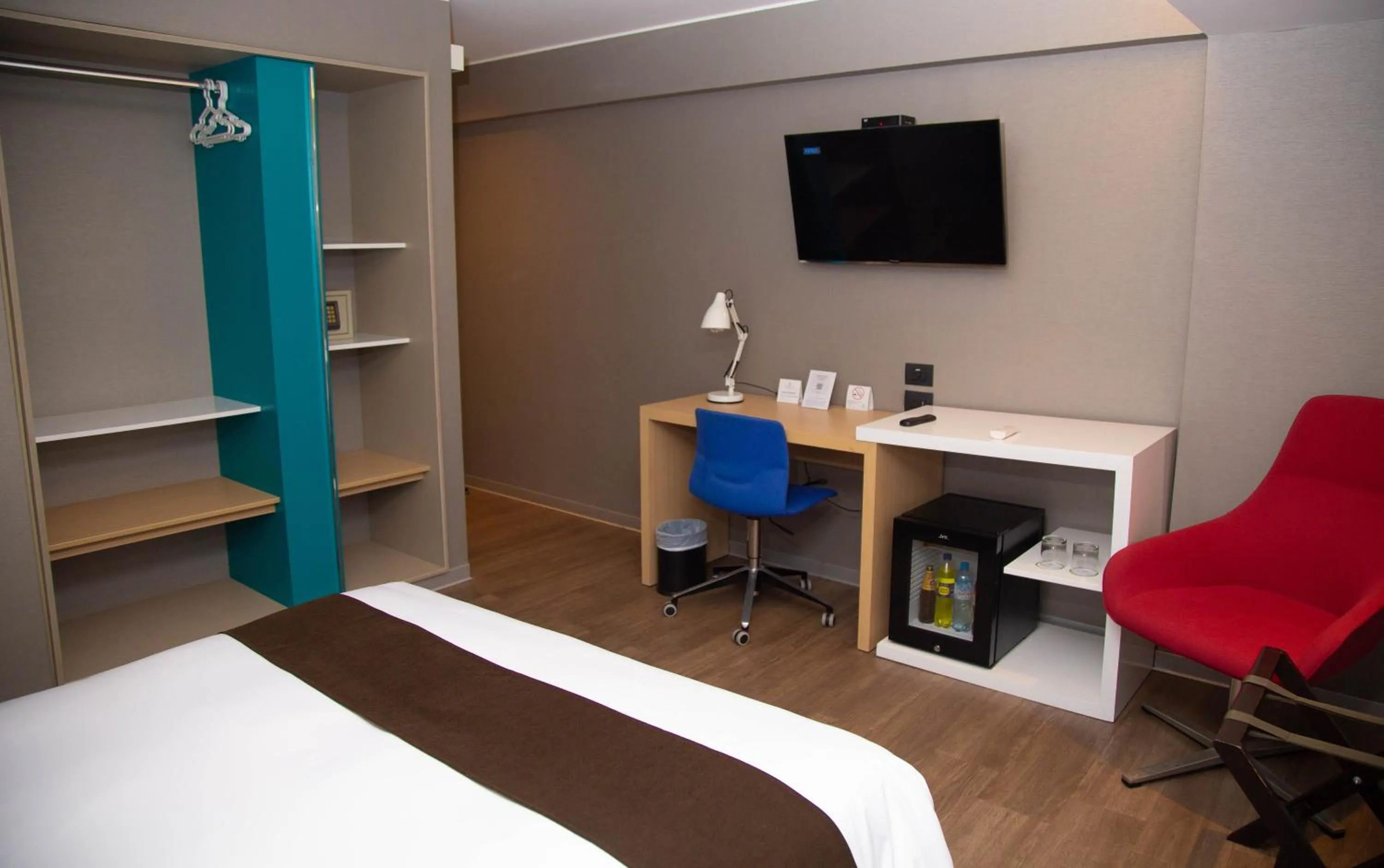 oven, Bed in Palmetto Hotel Business San Borja