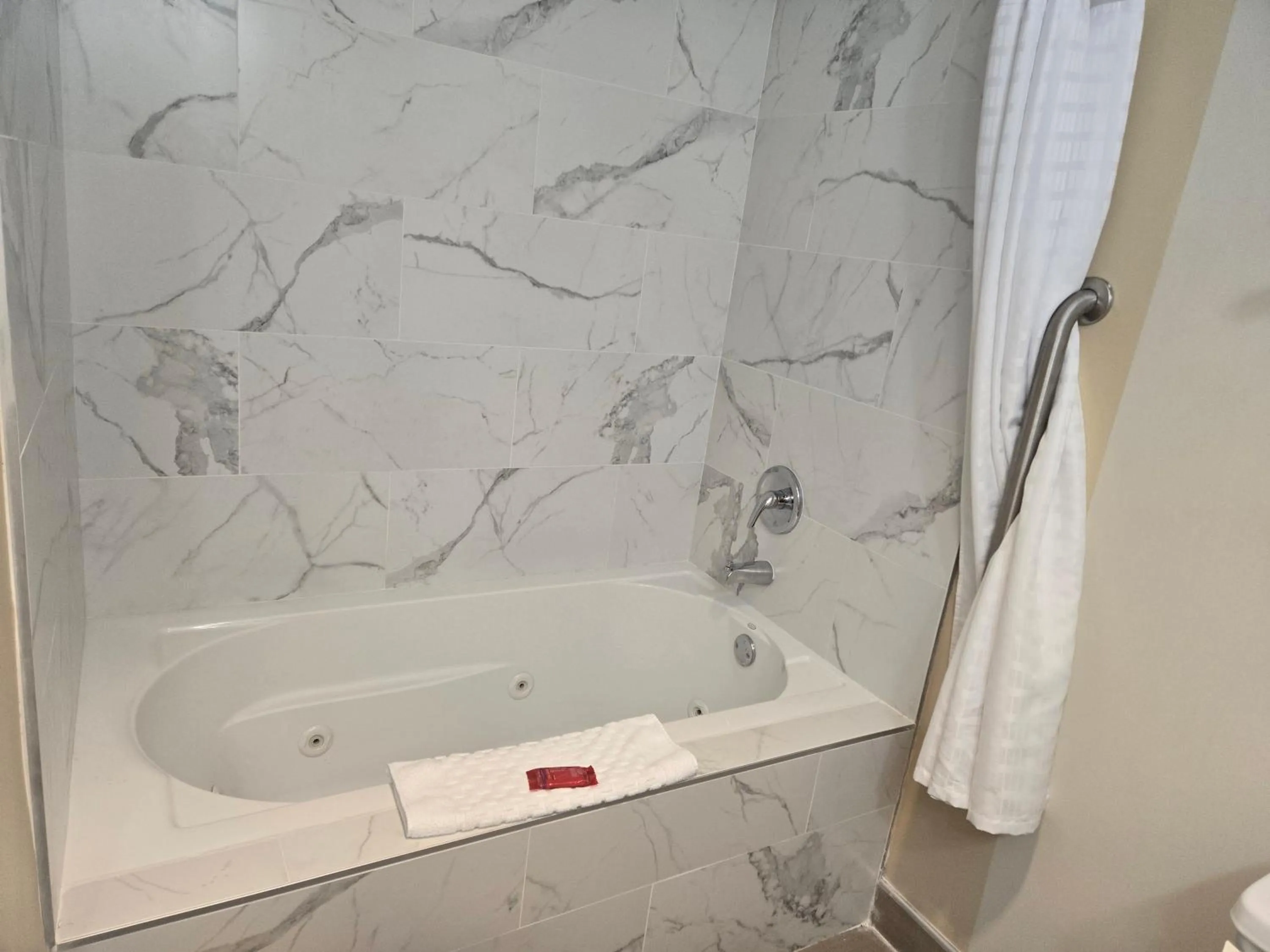 Shower in SureStay by Best Western Grayson