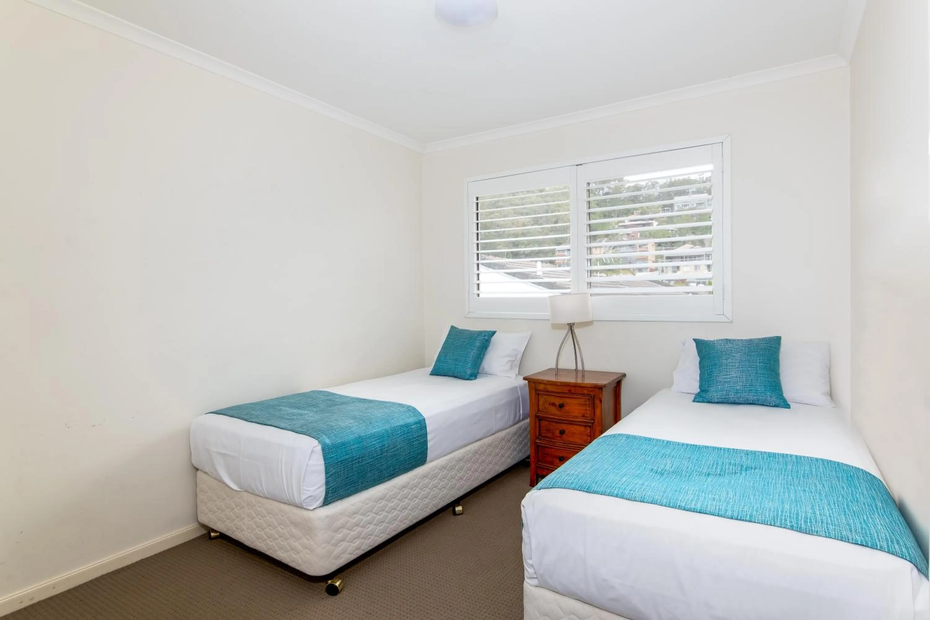 Bedroom, Bed in The Village Holiday Apartments at Burleigh Heads