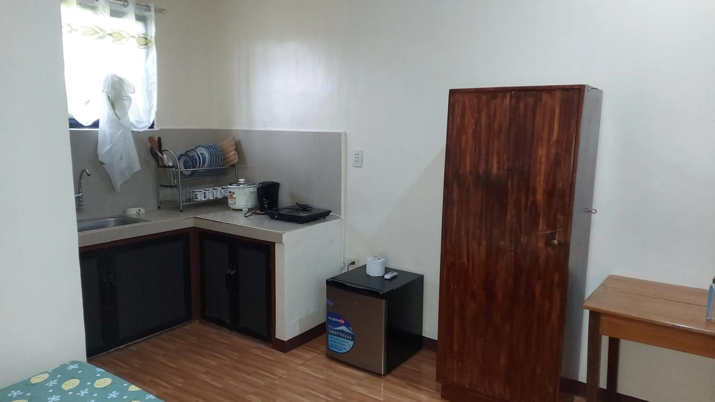 Kitchen or kitchenette in Gardenview Homestay Siargao