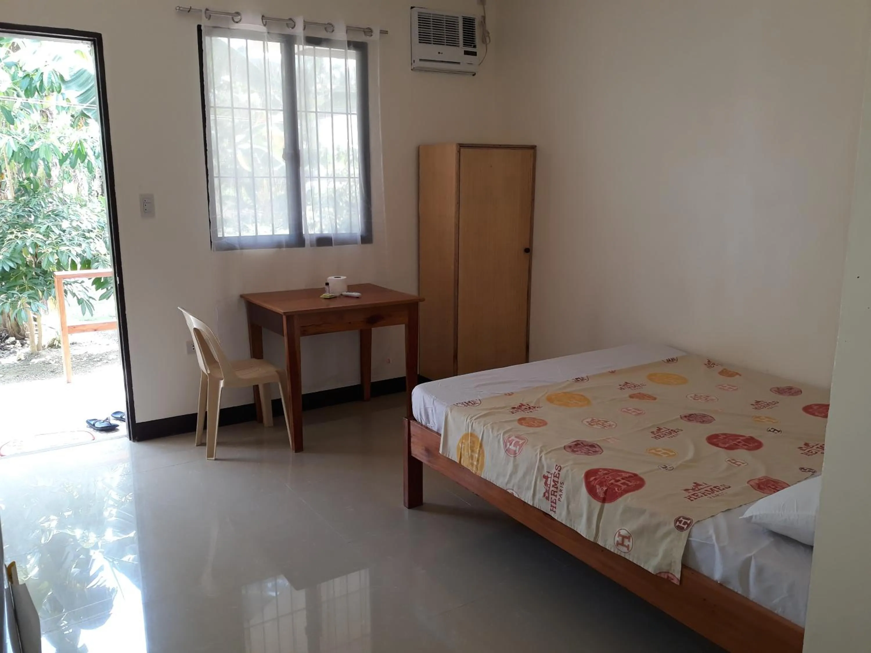 Photo of the whole room, Bed in Gardenview Homestay Siargao