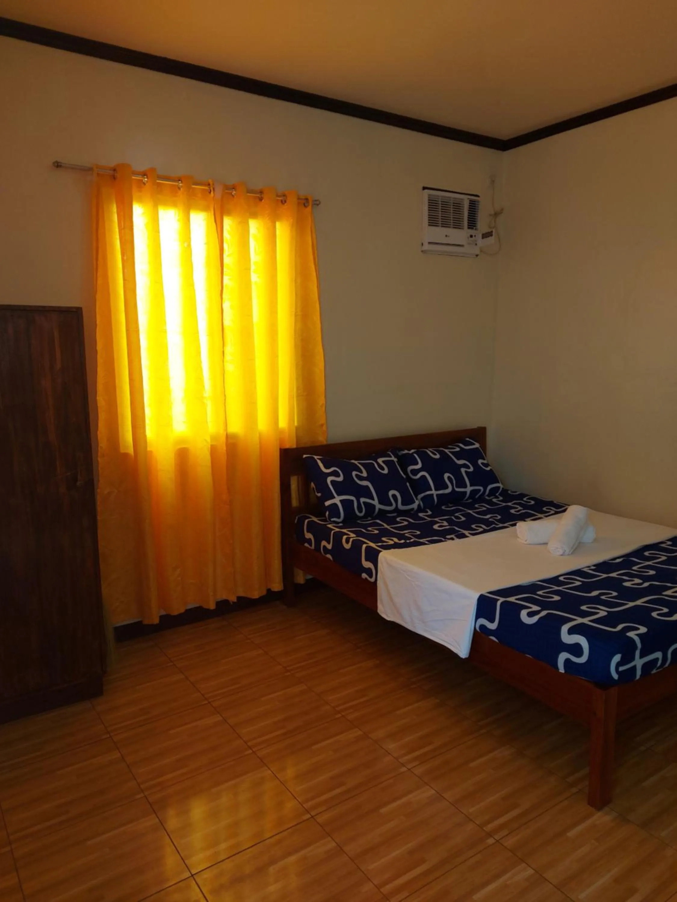 Photo of the whole room, Bed in Gardenview Homestay Siargao