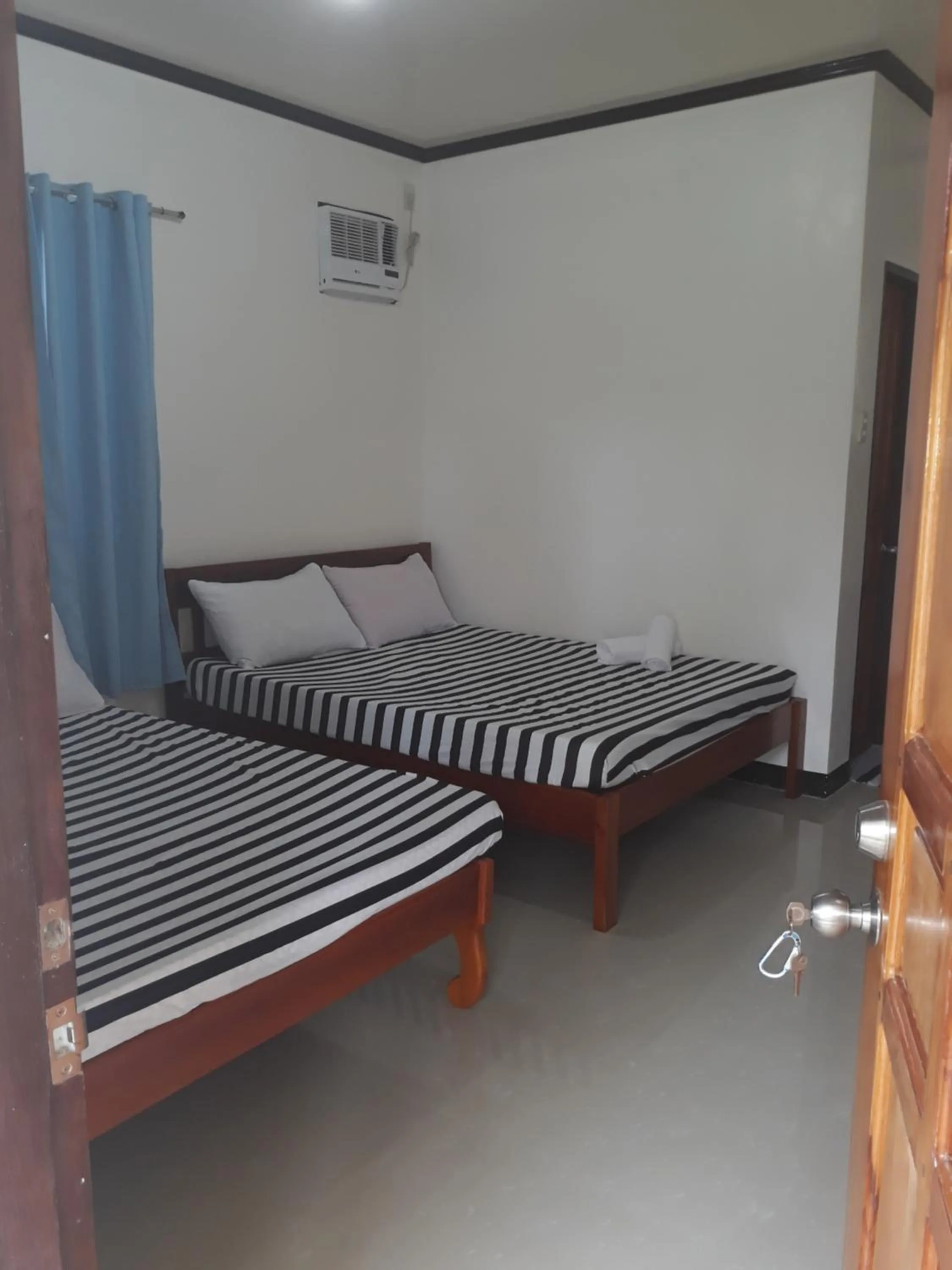 Photo of the whole room, Bed in Gardenview Homestay Siargao