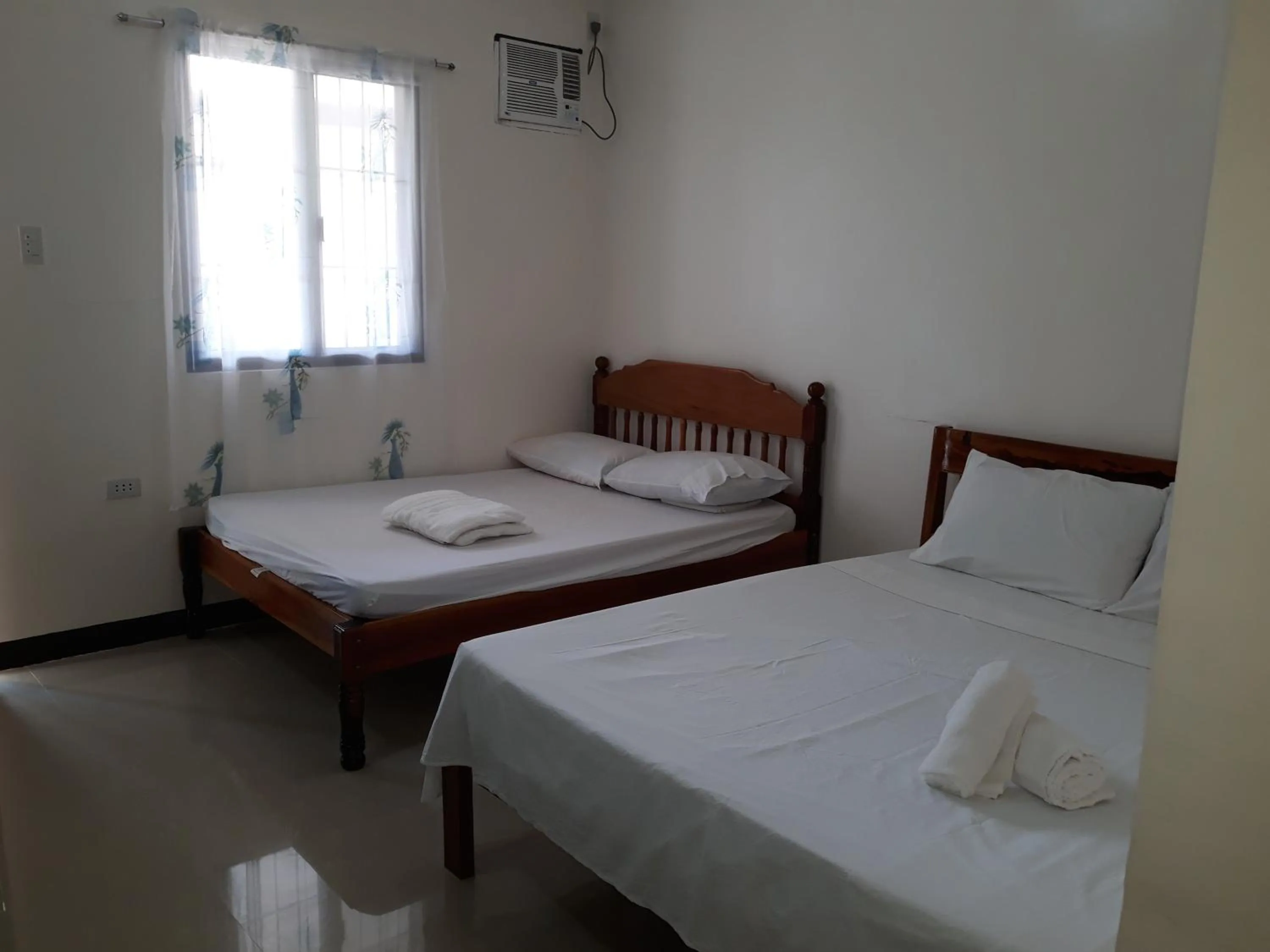 Photo of the whole room, Bed in Gardenview Homestay Siargao