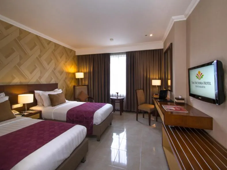 Photo of the whole room, Bed in The Victoria Hotel Yogyakarta