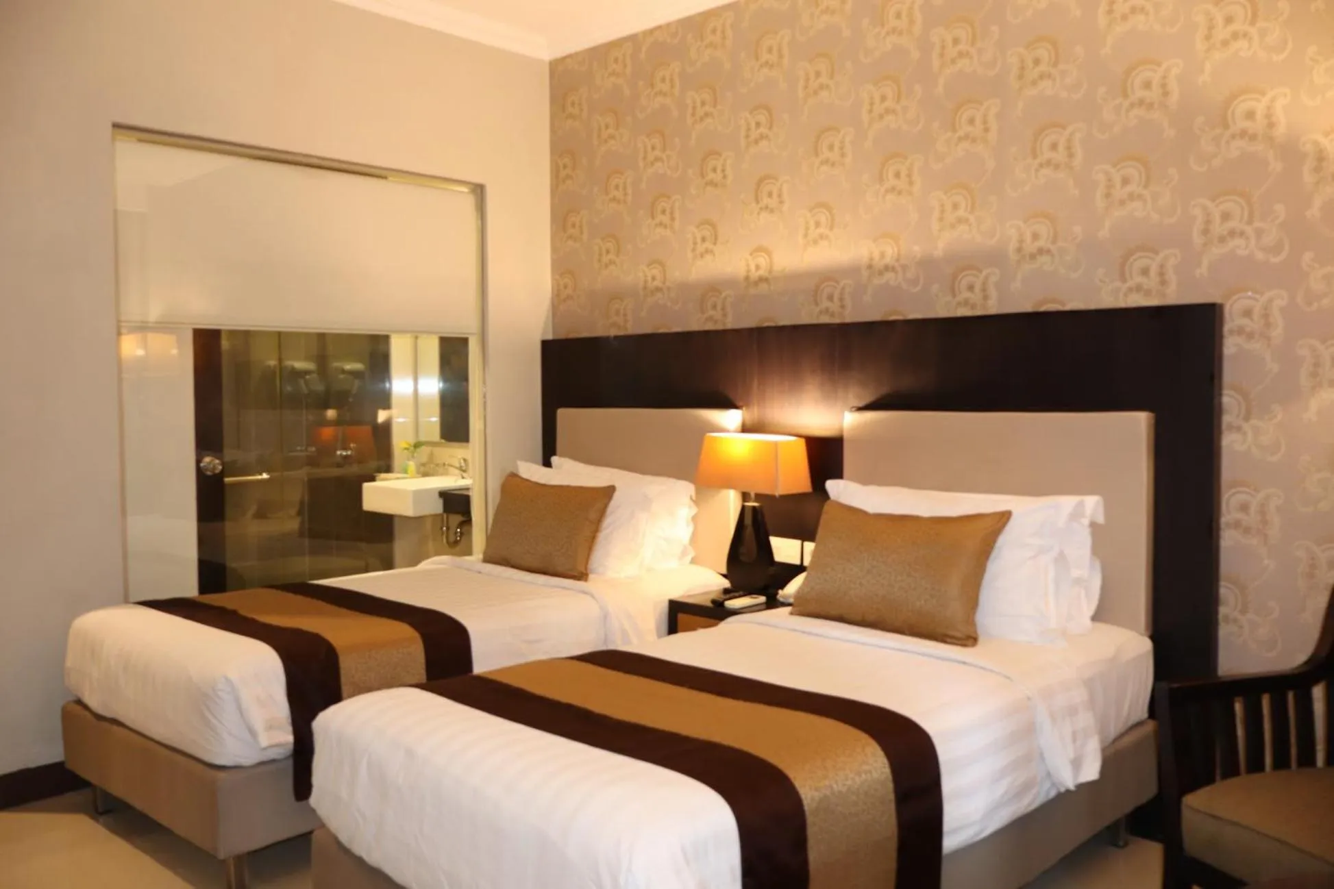 Bed in The Victoria Hotel Yogyakarta