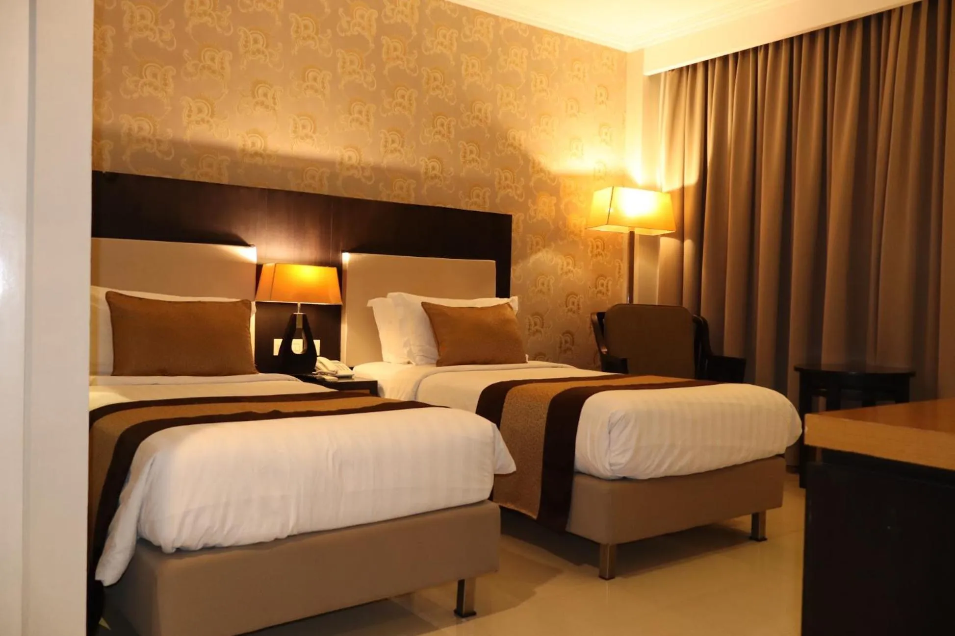 Bed in The Victoria Hotel Yogyakarta