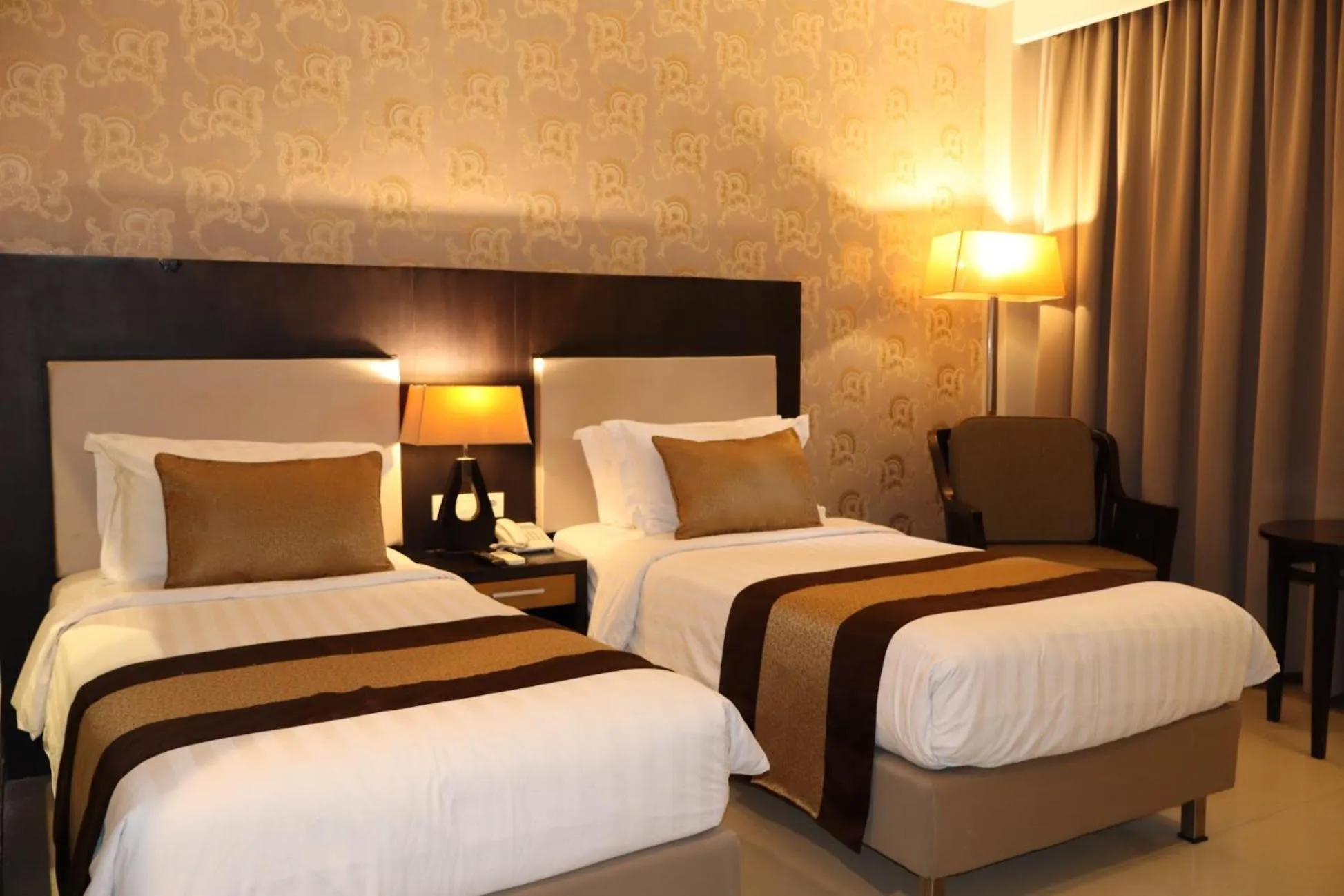 Bed in The Victoria Hotel Yogyakarta