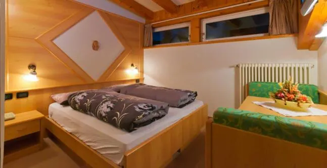Bed in Chalet Pineta relax location