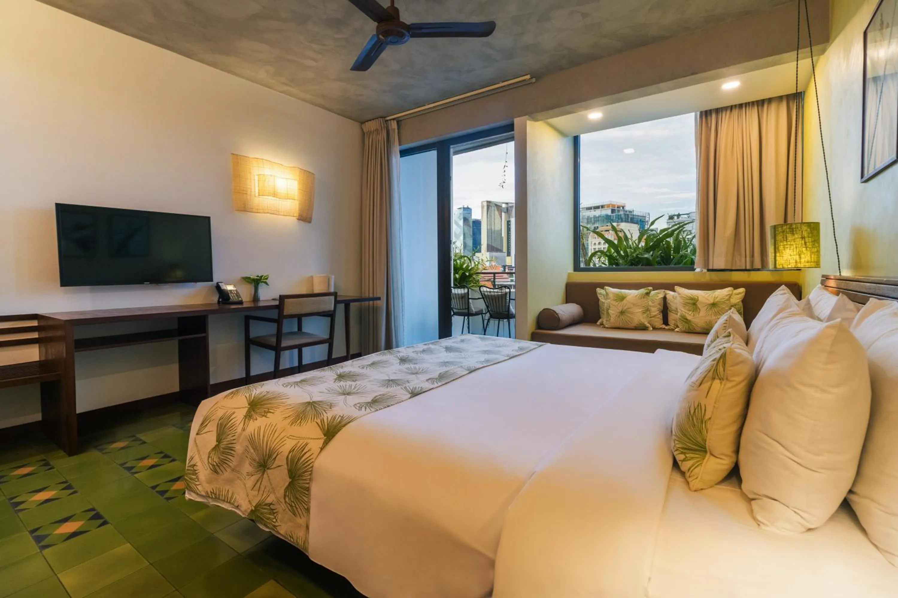 Bed in Penh House Hotel