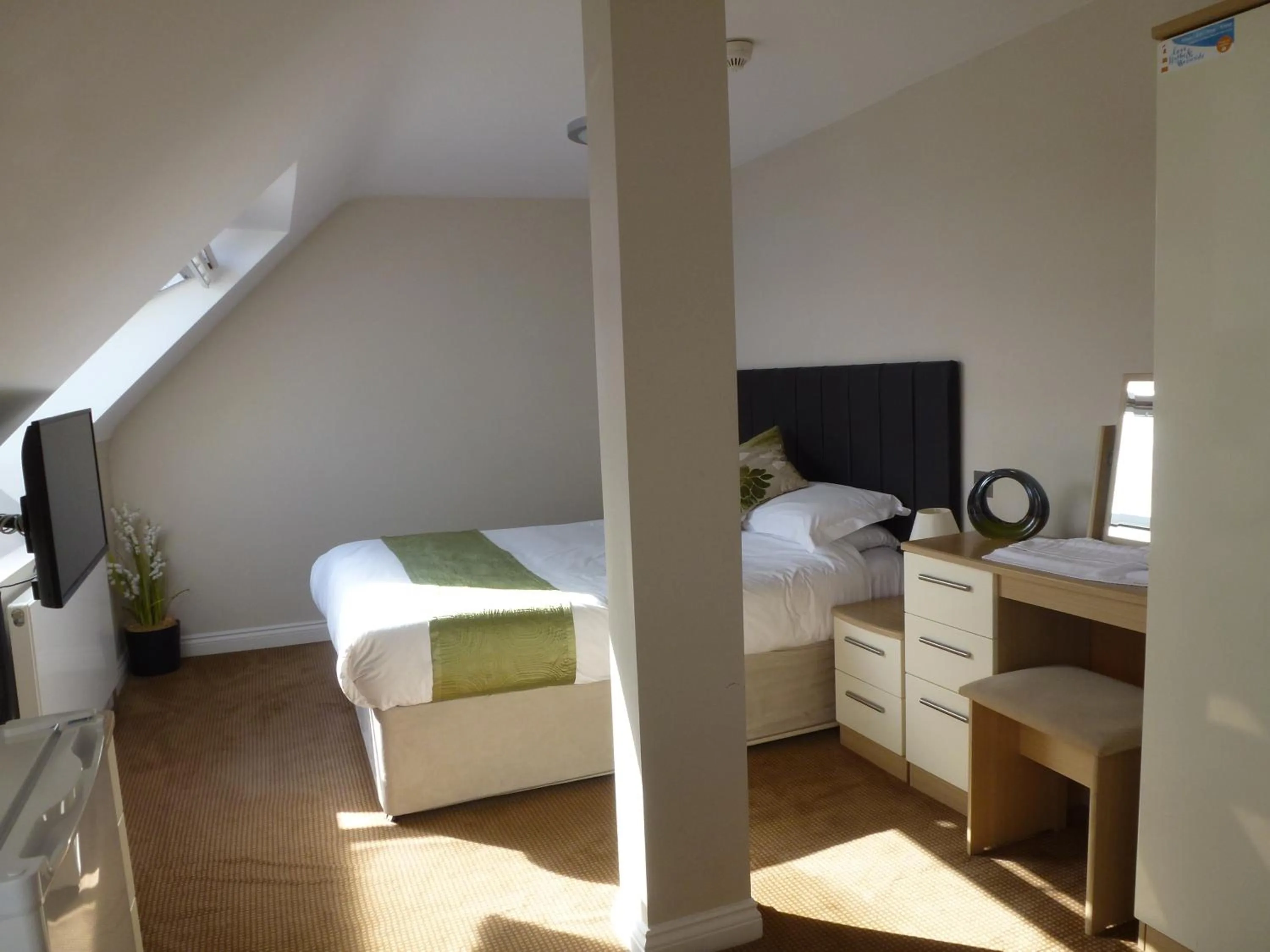 Bed in Boathouse Hotel