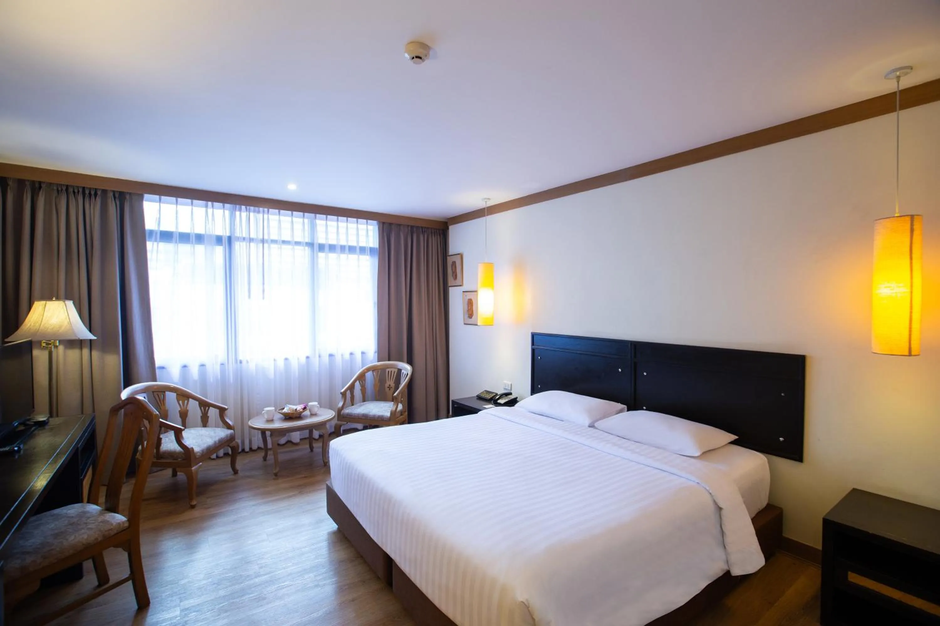 Bed in The Tarntawan Hotel Surawong Bangkok