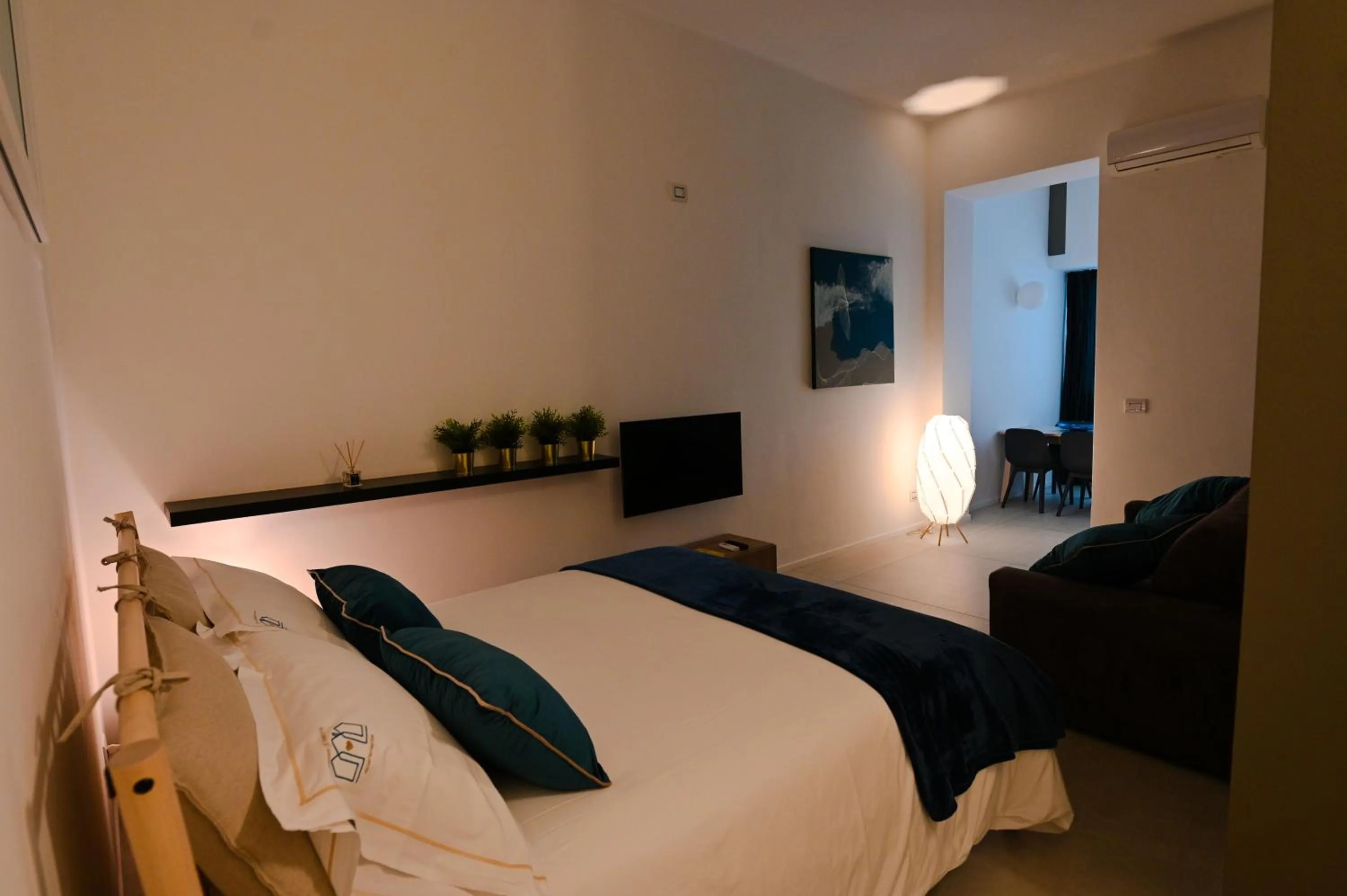 Seating area, Bed in Casa Di Mamma