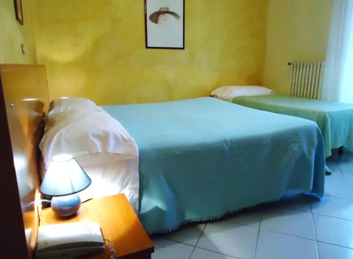 Photo of the whole room, Bed in Hotel Miramonti