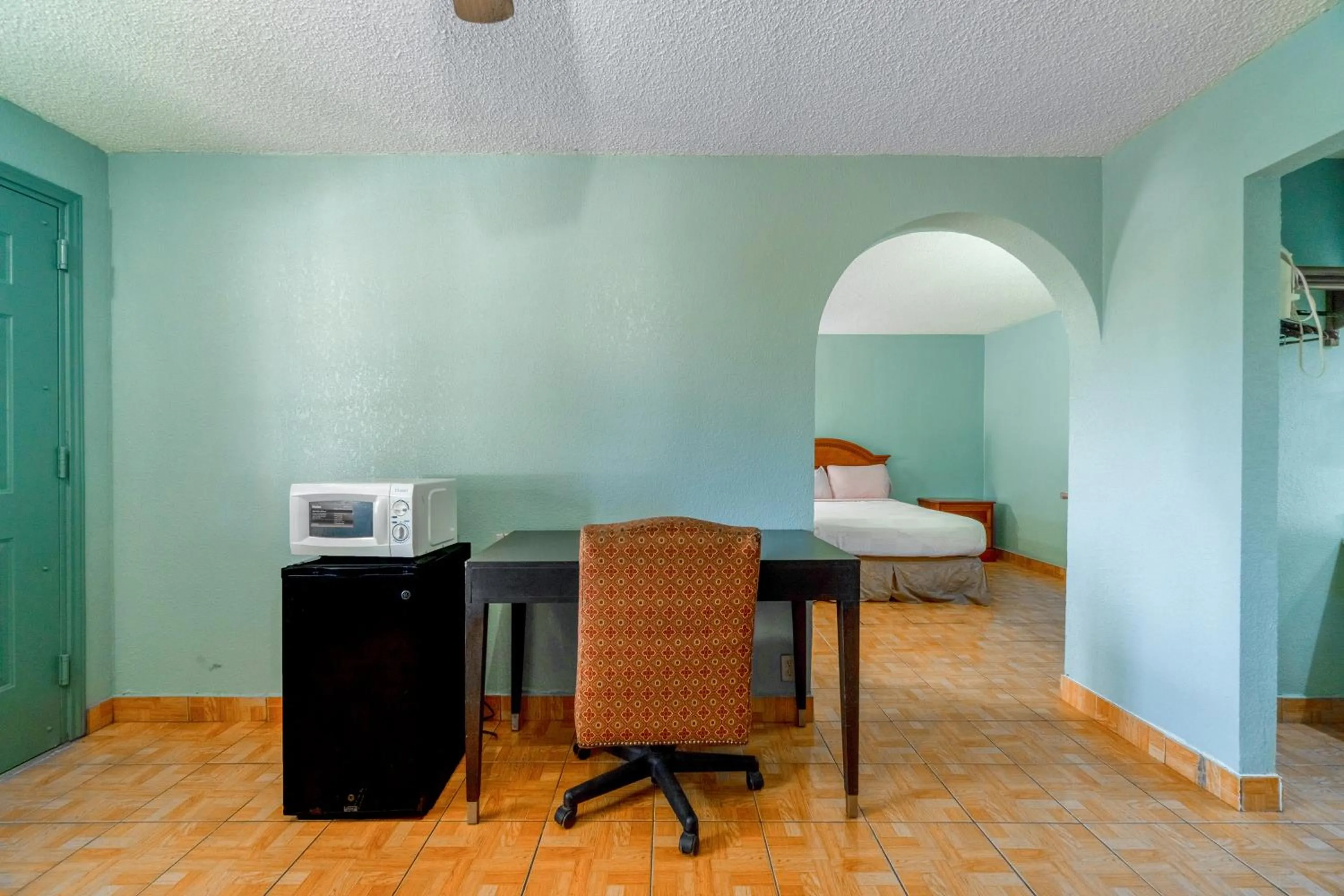 Bedroom in Lone Star Inn & Suites by OYO Harlingen TX