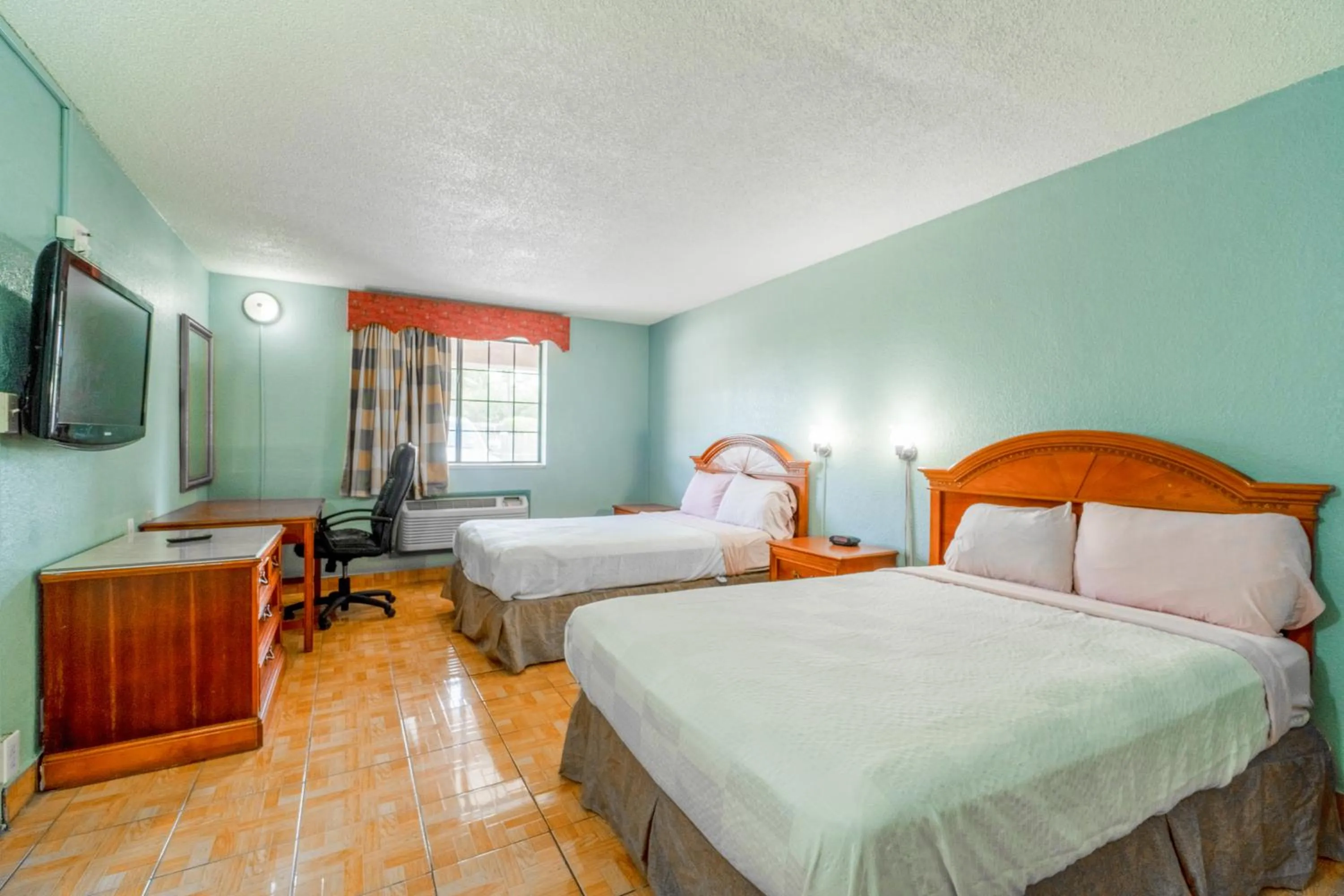 Bedroom, Bed in Lone Star Inn & Suites by OYO Harlingen TX