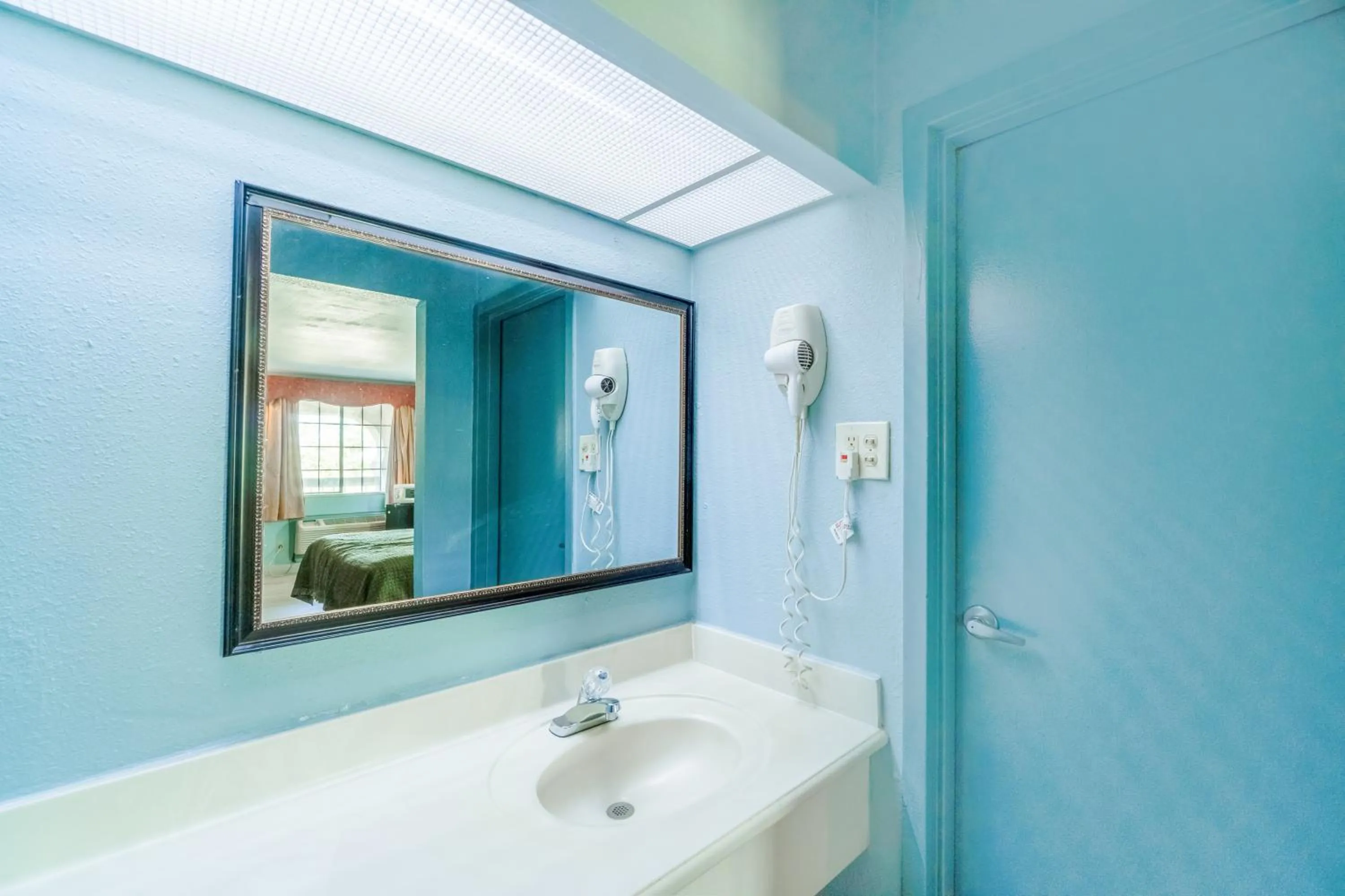 Bathroom in Lone Star Inn & Suites by OYO Harlingen TX