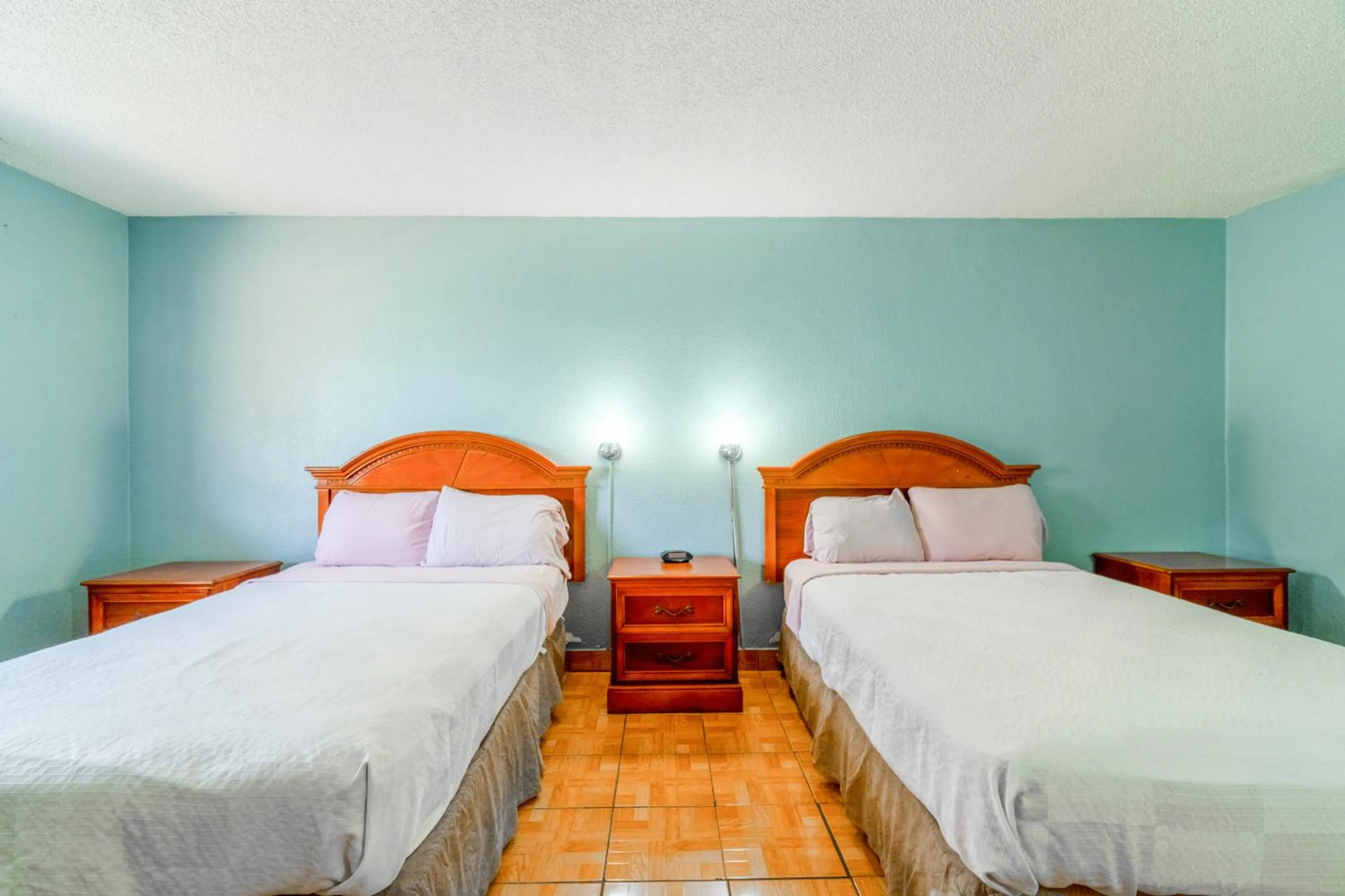 Bedroom, Bed in Lone Star Inn & Suites by OYO Harlingen TX