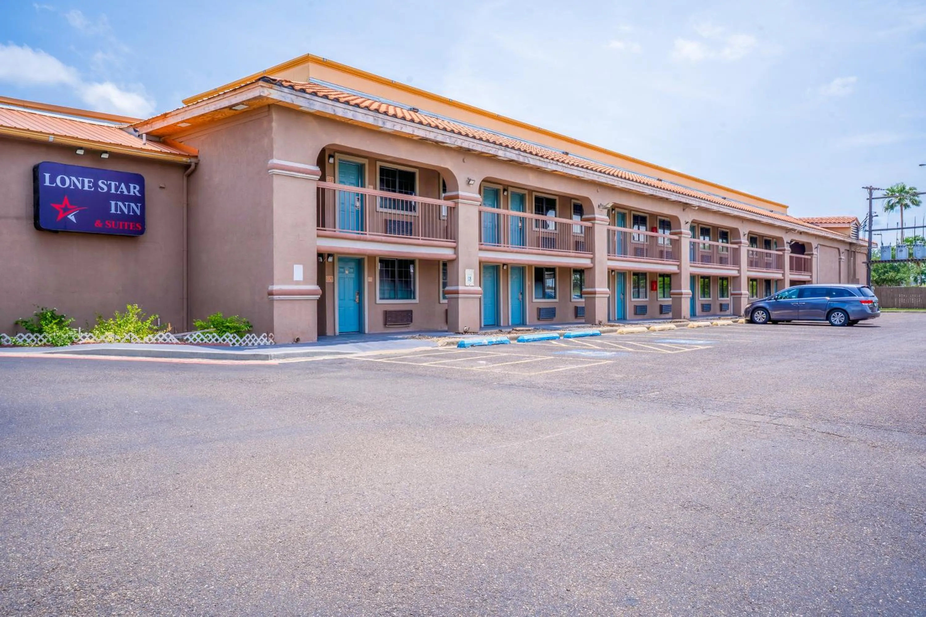 Property building in Lone Star Inn & Suites by OYO Harlingen TX
