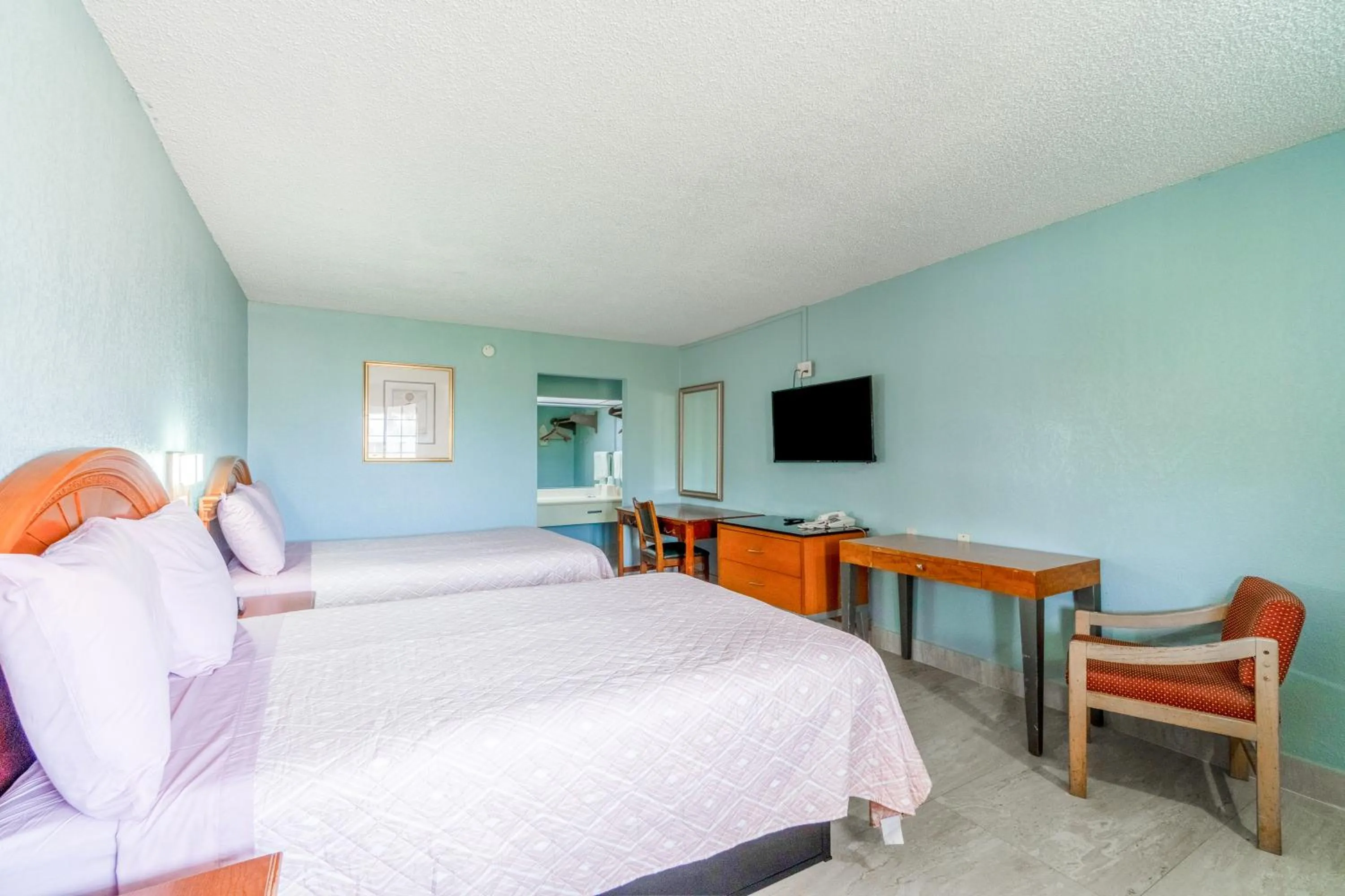 Bedroom, Bed in Lone Star Inn & Suites by OYO Harlingen TX