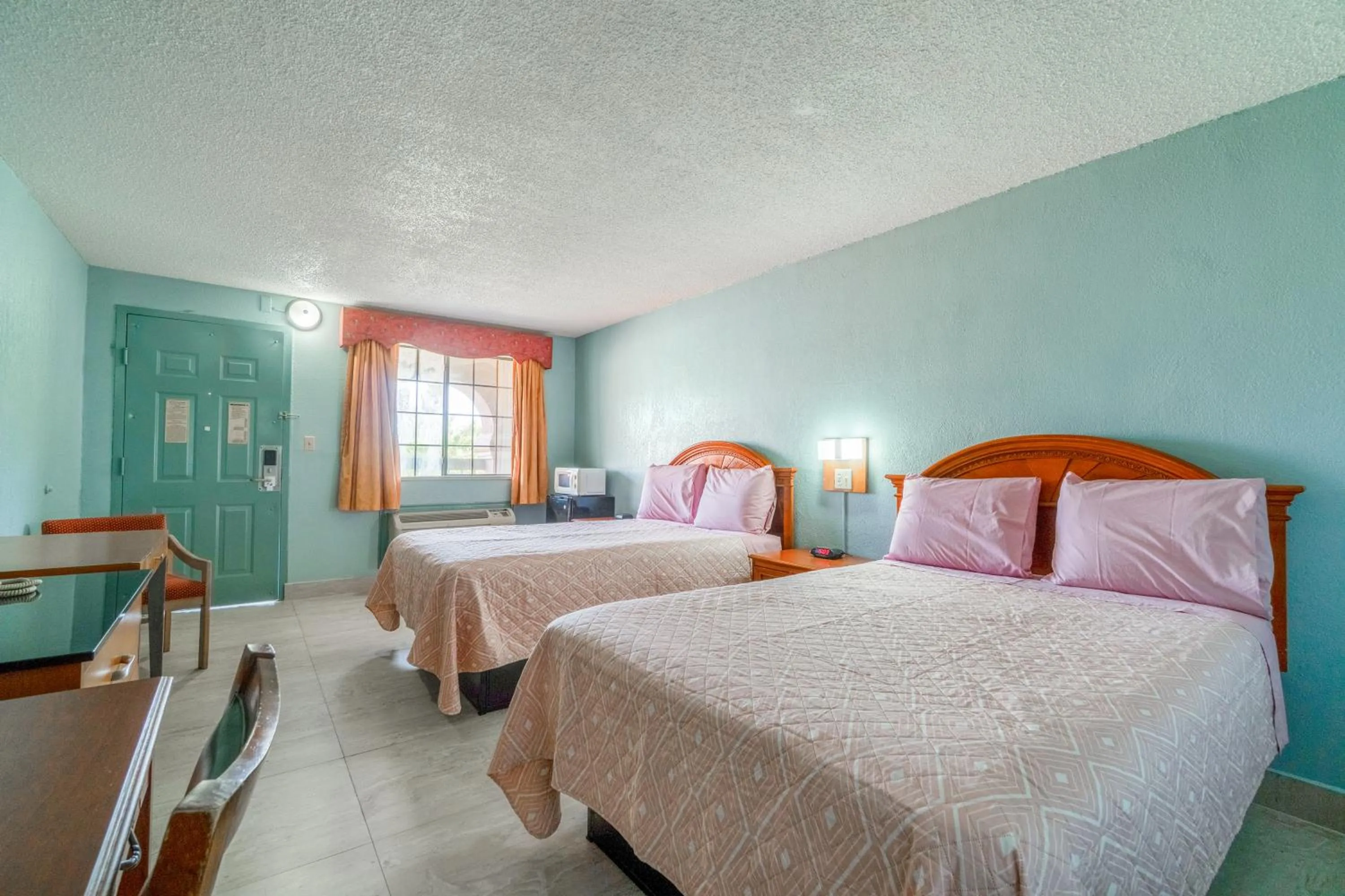 Bedroom, Bed in Lone Star Inn & Suites by OYO Harlingen TX