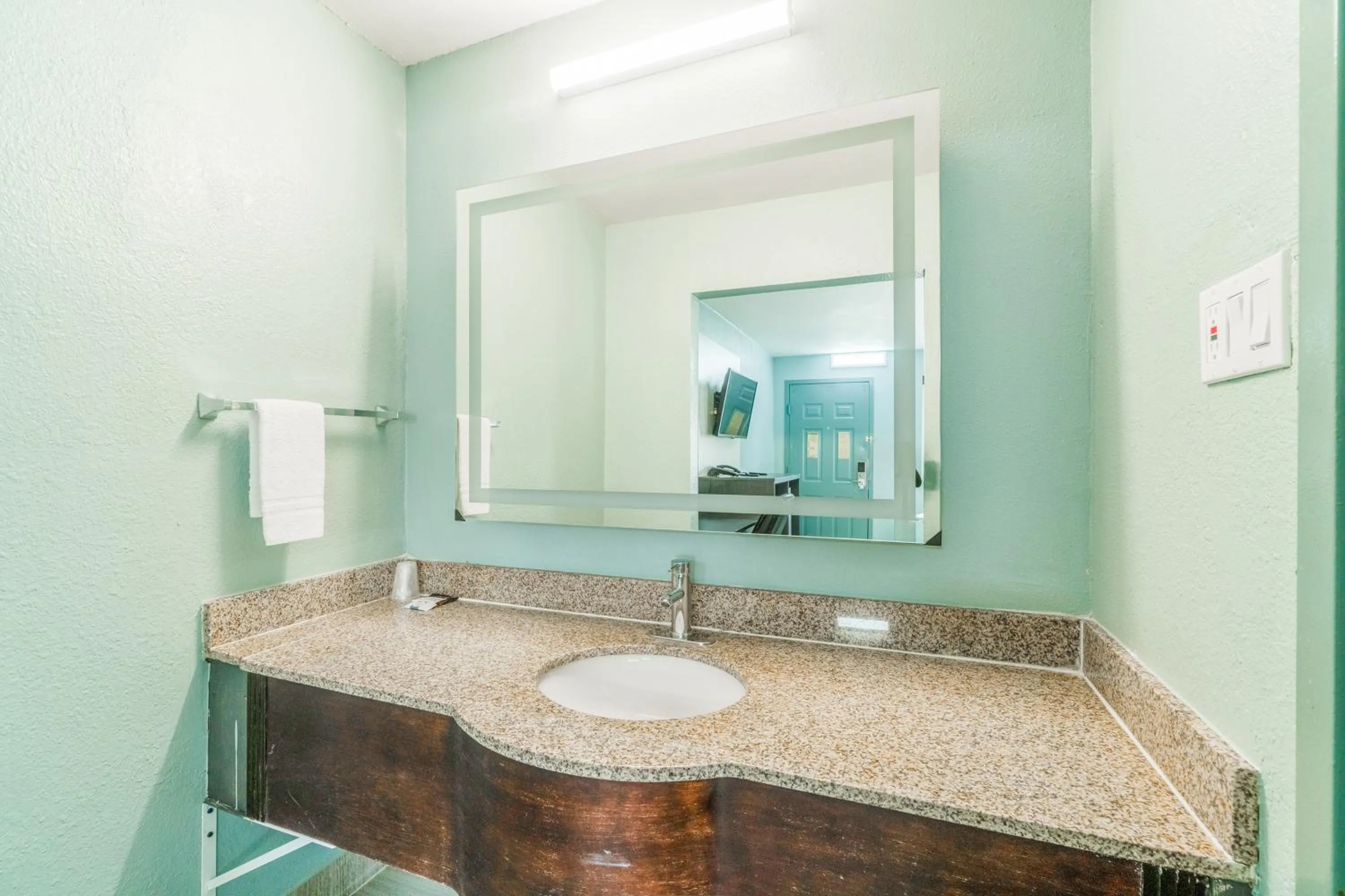 Bathroom in Lone Star Inn & Suites by OYO Harlingen TX
