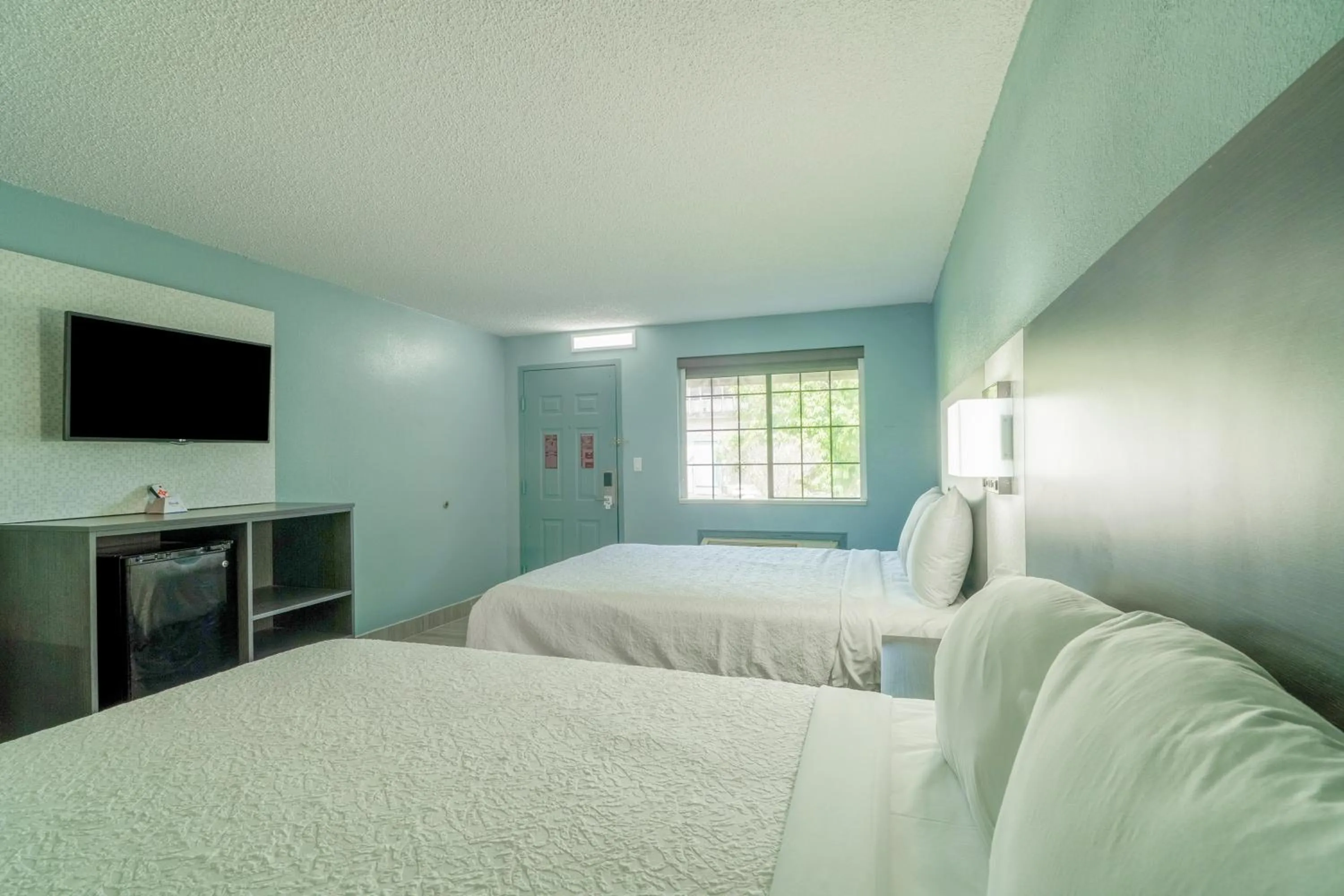 Bedroom, Bed in Lone Star Inn & Suites by OYO Harlingen TX