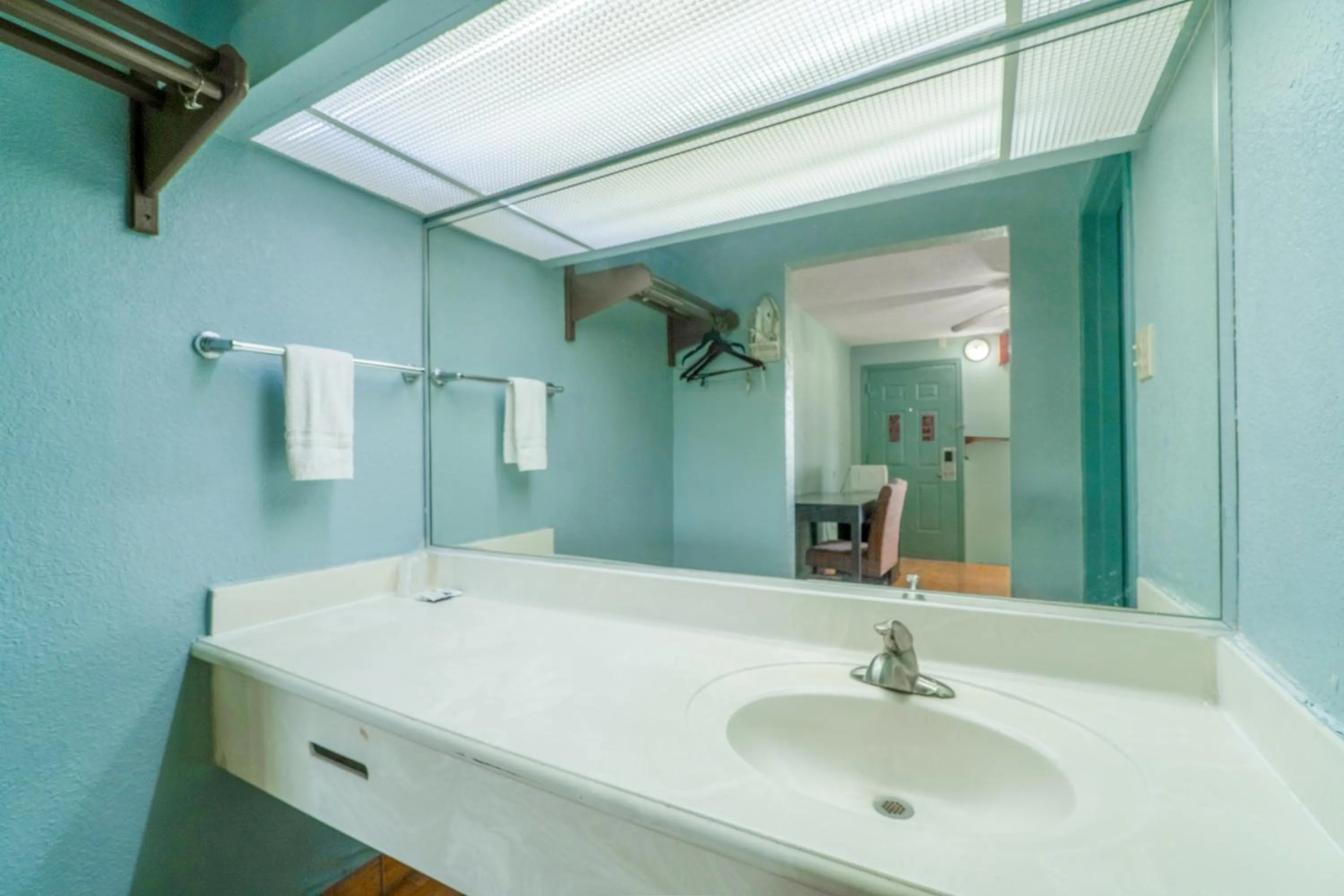 Bathroom in Lone Star Inn & Suites by OYO Harlingen TX